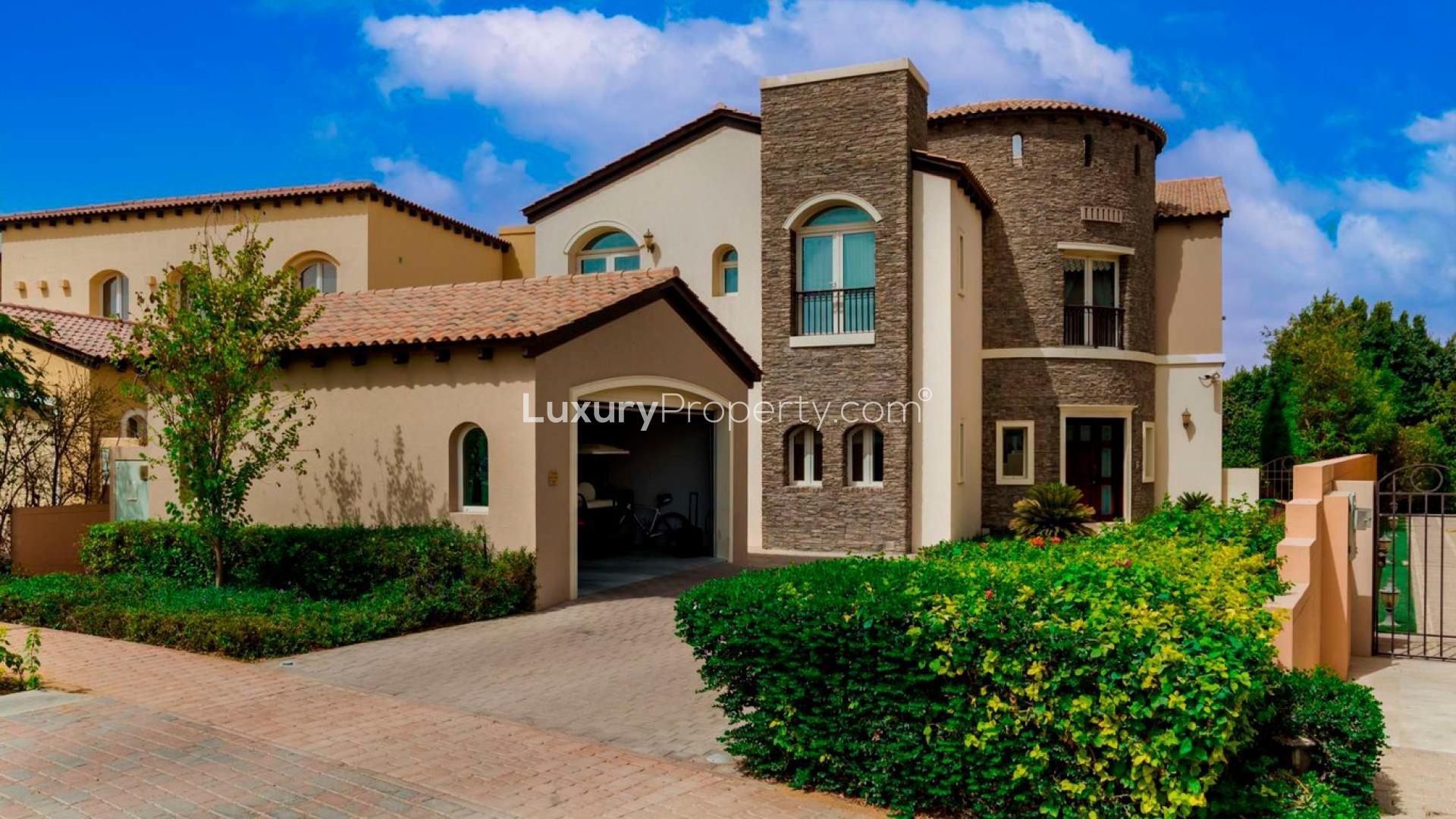 Exterior view of spacious 5-bedroom villa in Jumeirah Golf Estates, Fire community. For sale