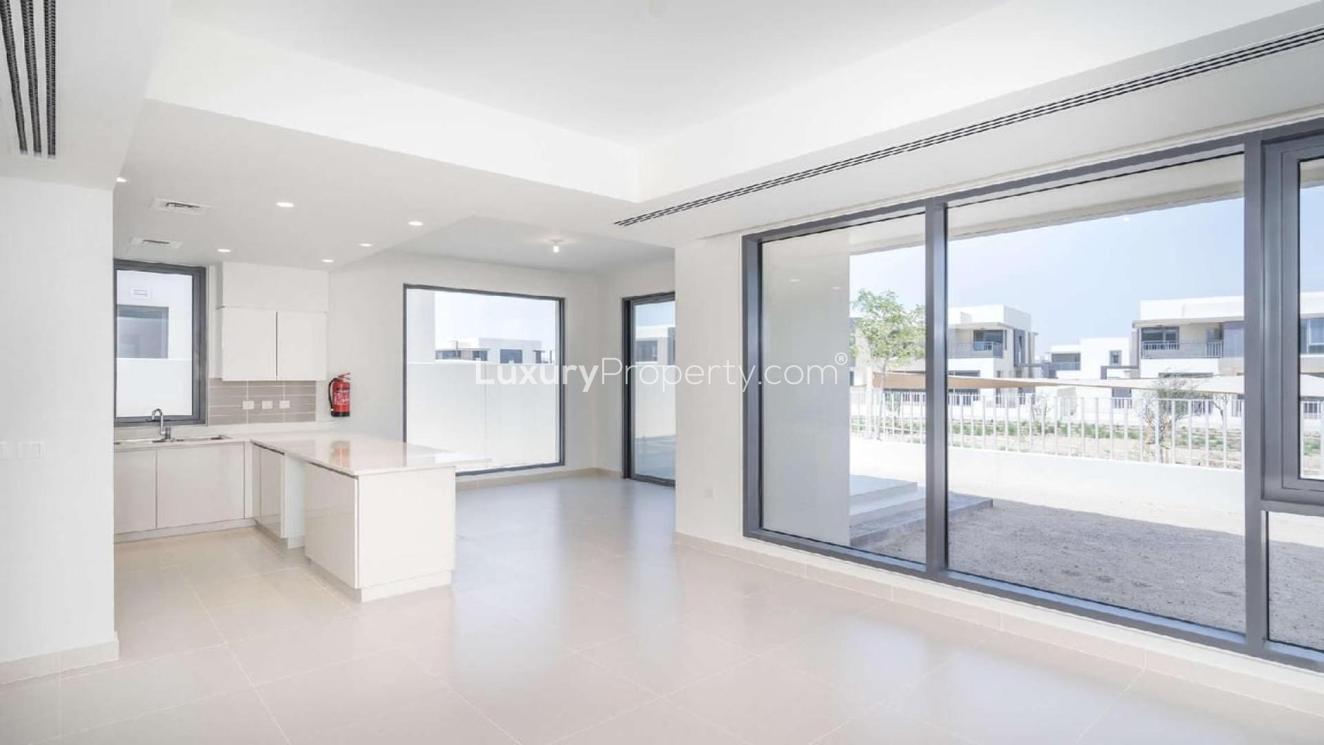 Modern kitchen and spacious living area in Dubai Hills Estate villa for sale
