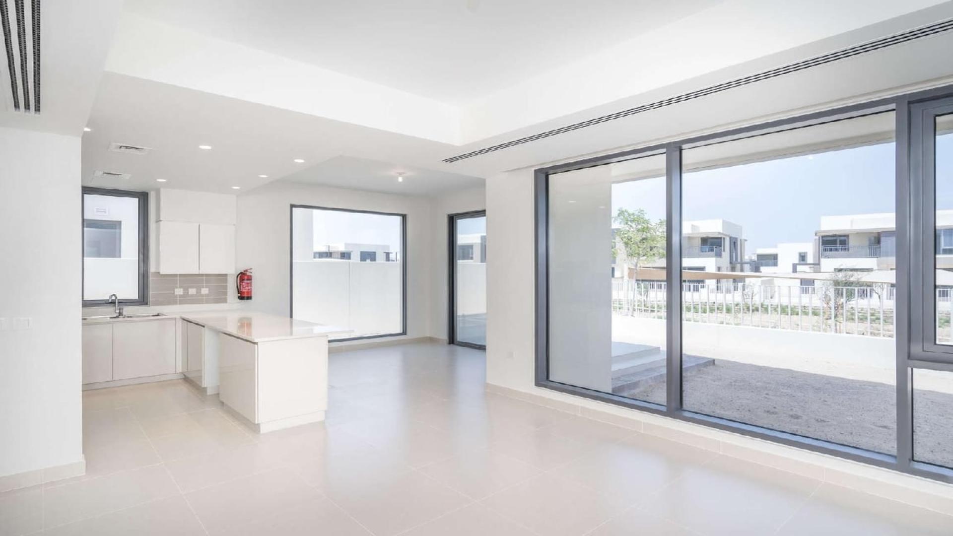 Modern kitchen and spacious living area in Dubai Hills Estate villa for sale