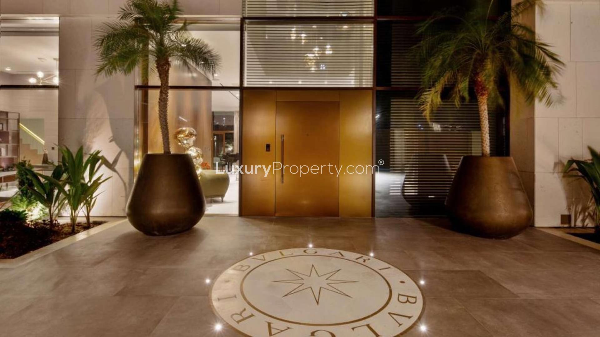 Luxurious villa poolside view at night, Jumeirah Bay Island, Dubai mansion for sale