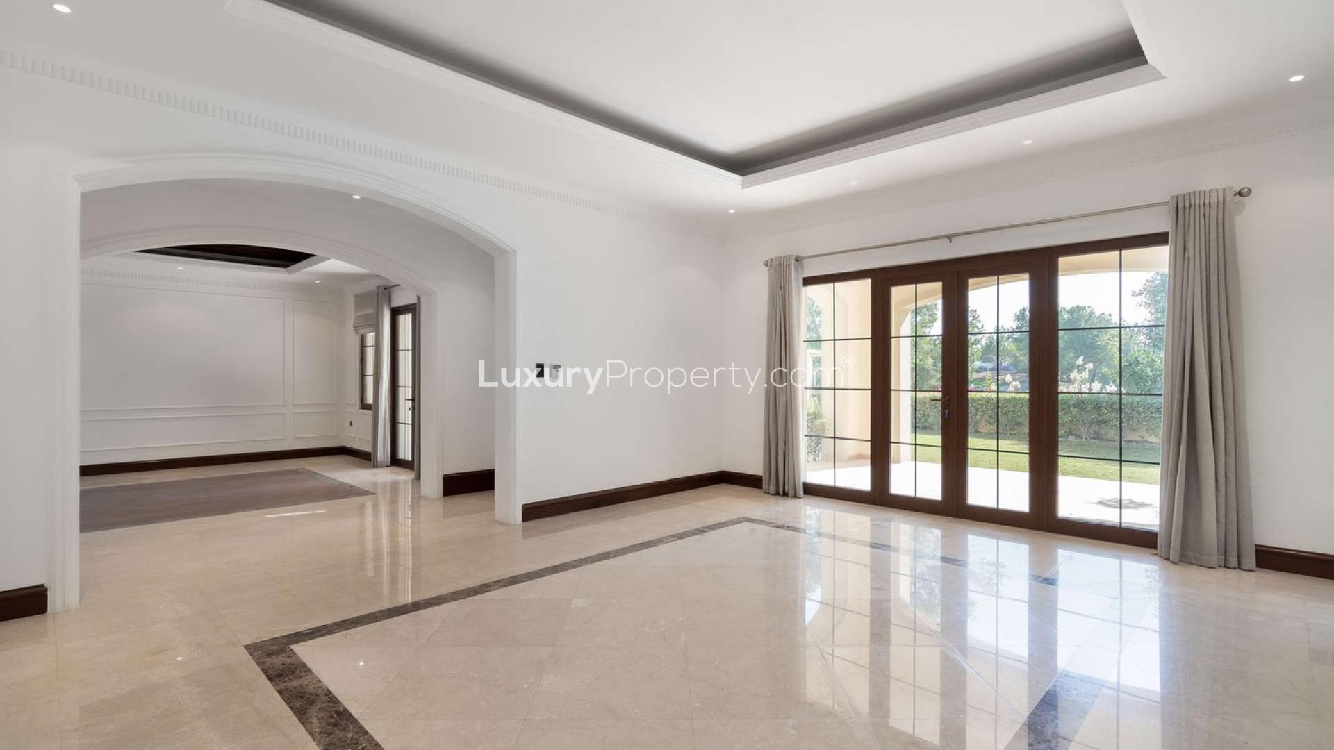 Modern kitchen in luxury villa, Jumeirah Golf Estates, Earth, with large windows and island