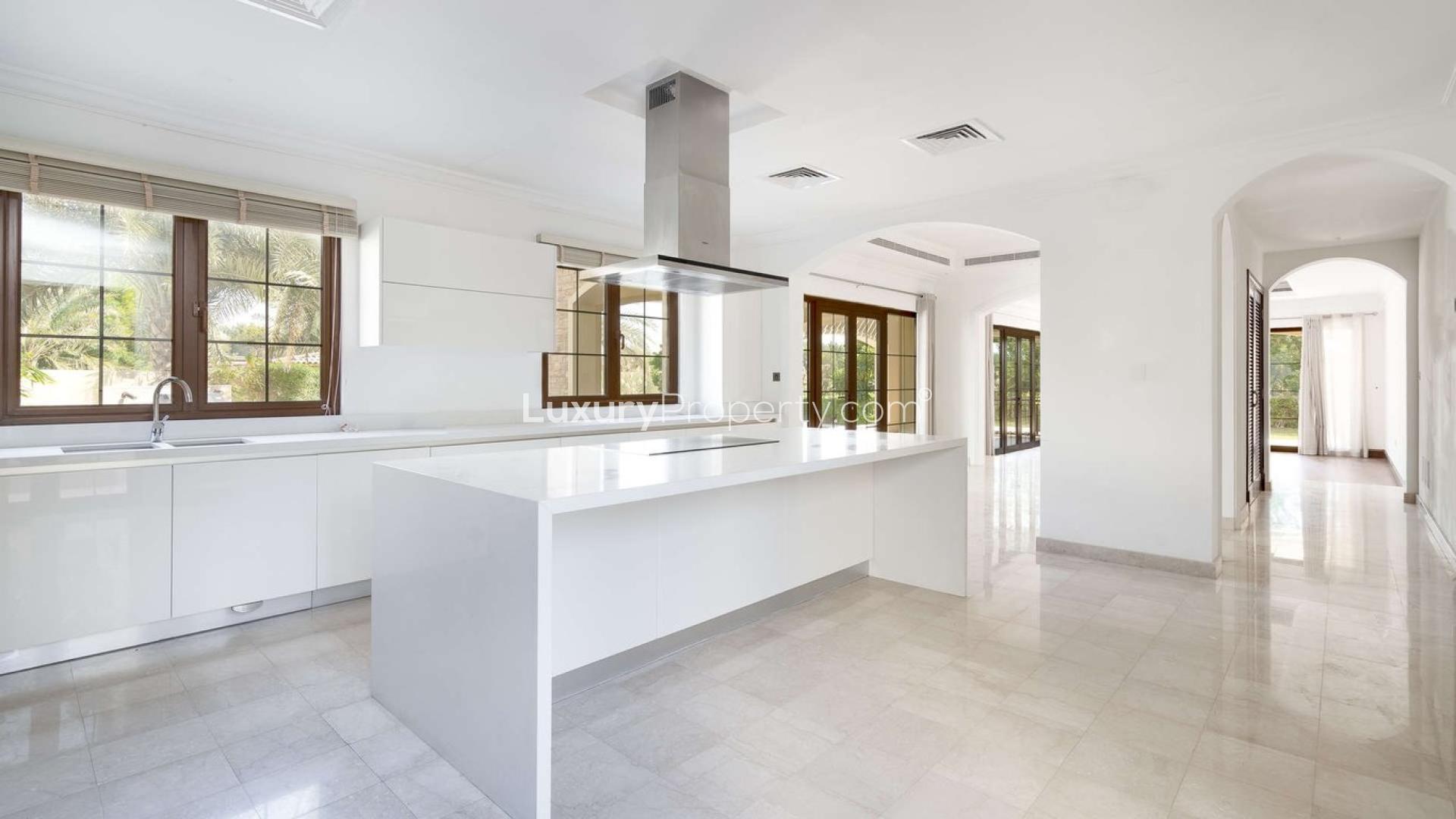 Spacious villa interior with large windows, marble floors in Jumeirah Golf Estates, Earth community