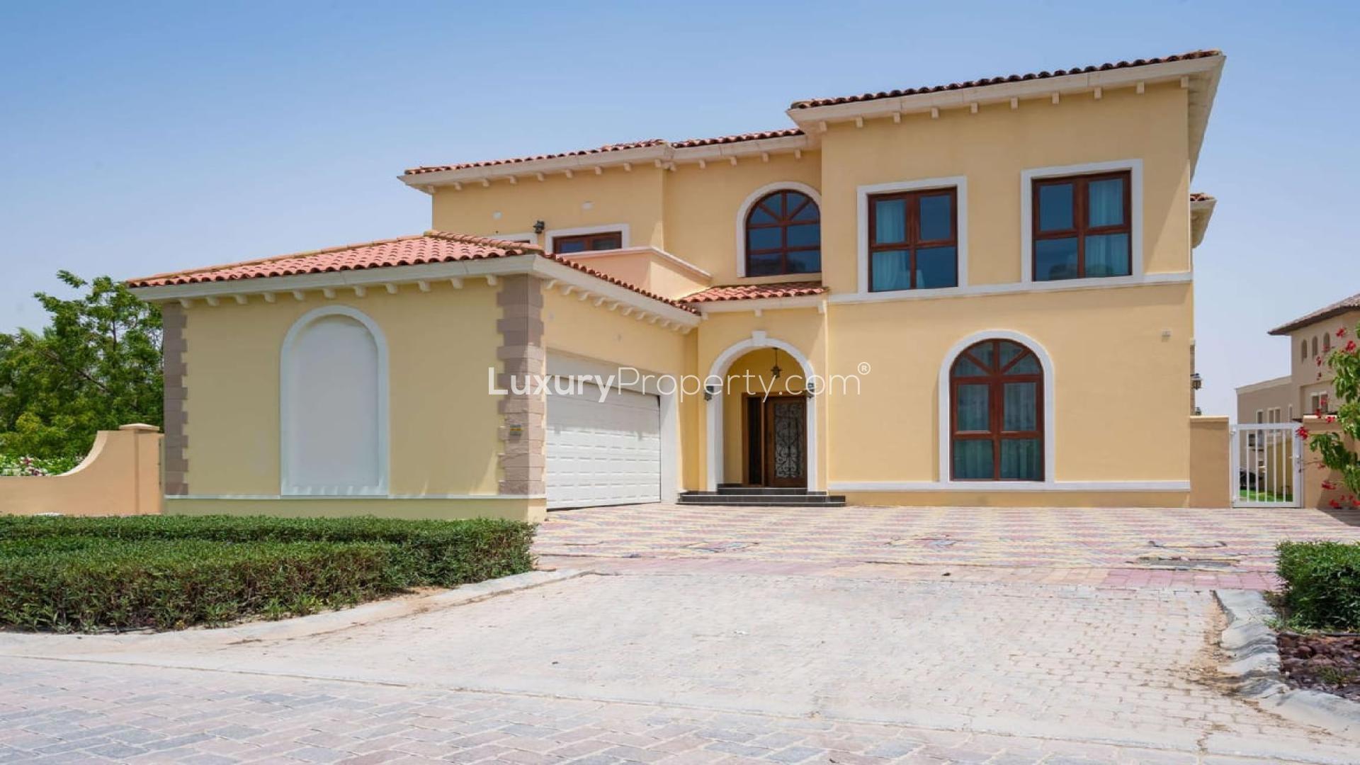 Furnished living and dining area in a luxury villa, Jumeirah Golf Estates, for sale