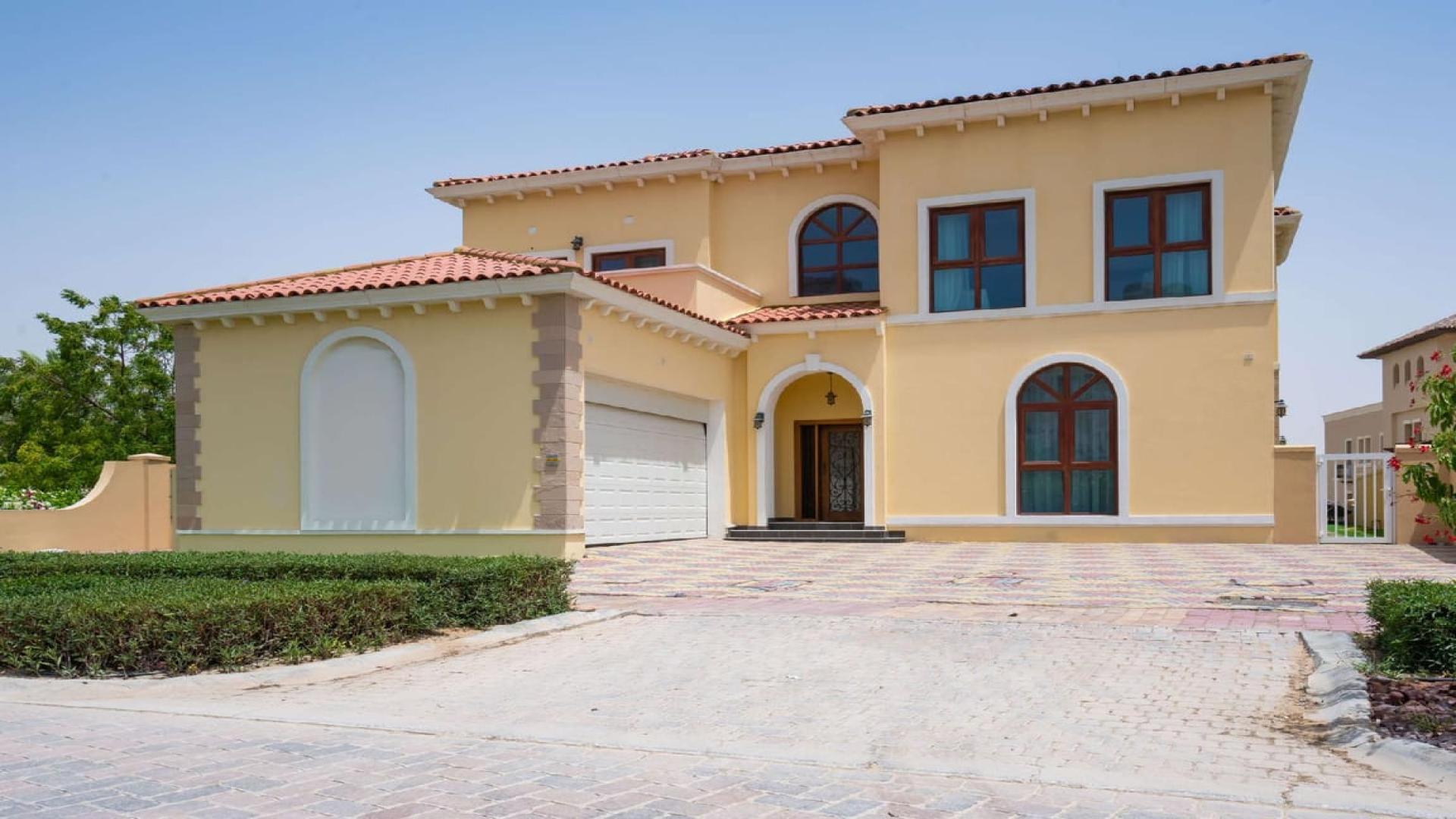 Furnished living and dining area in a luxury villa, Jumeirah Golf Estates, for sale