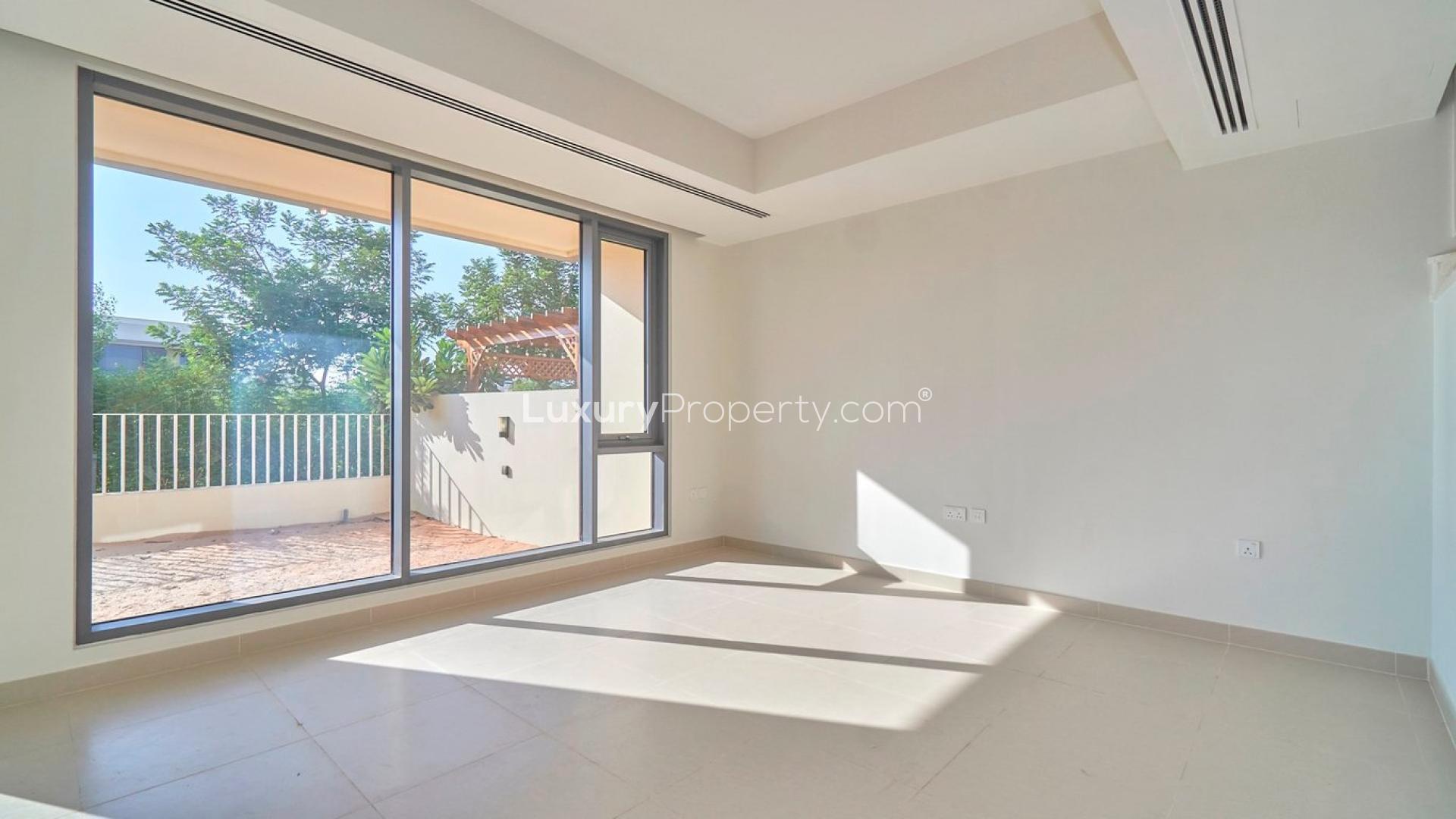 Dubai Hills Estate townhouse balcony view, modern design, overlooking community landscape in Maple