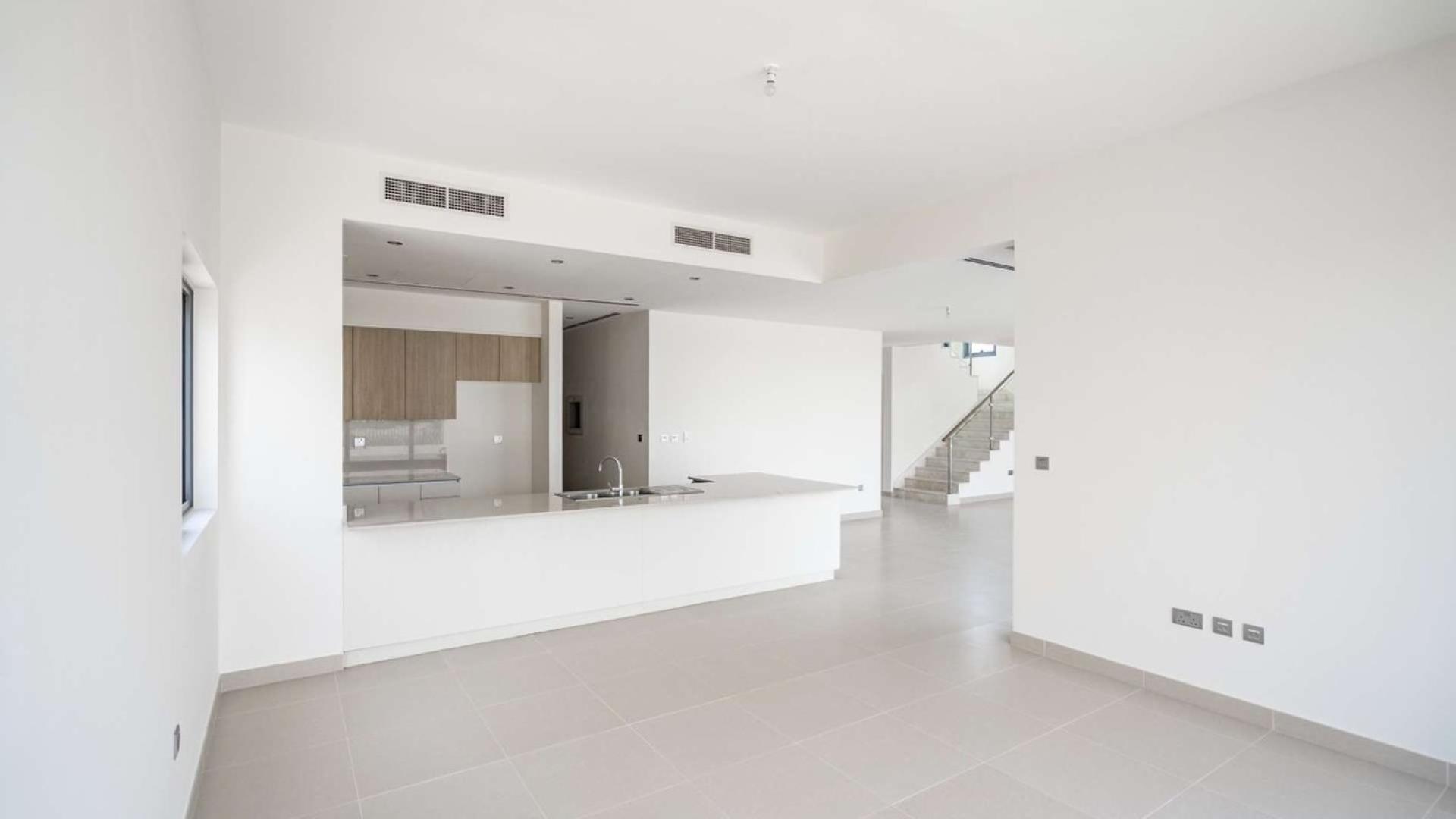 Modern kitchen and open living space in Sidra Villa, Dubai Hills Estate