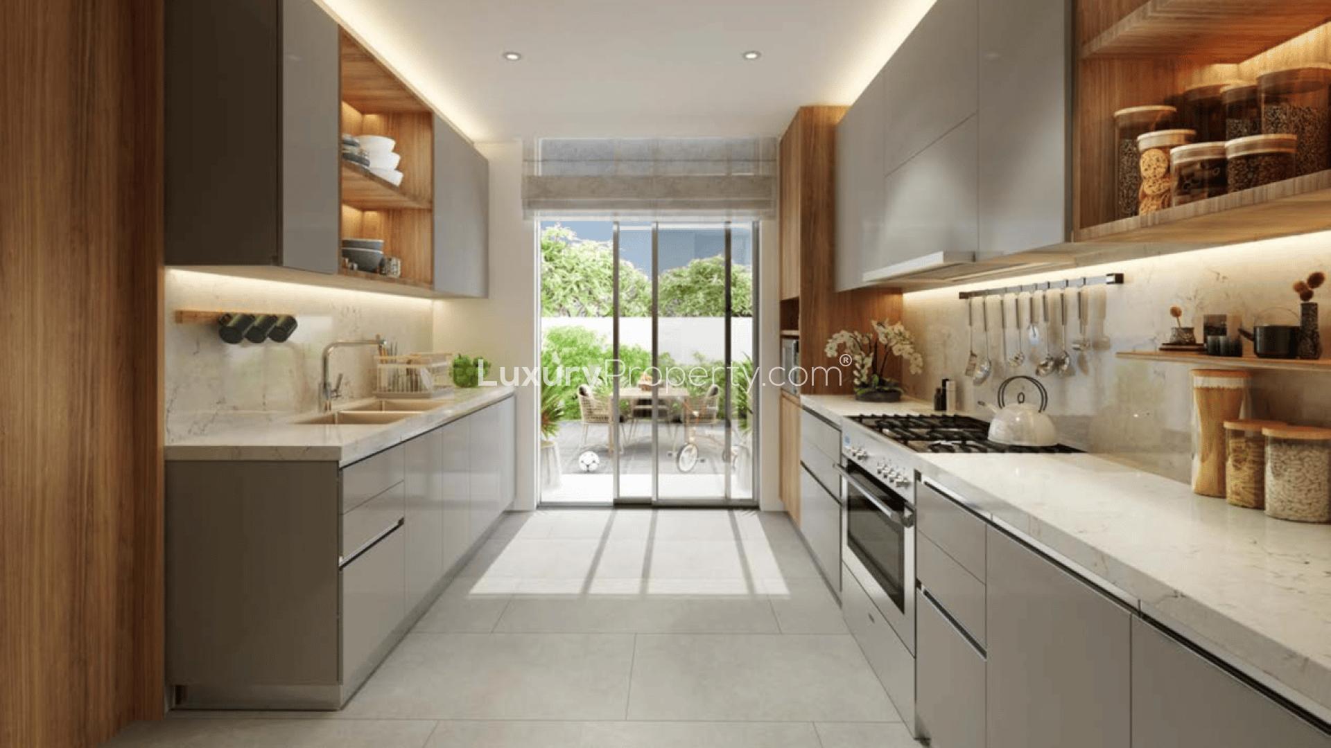 Luxurious living room with pool view in Jebel Ali Village five-bedroom villa for sale