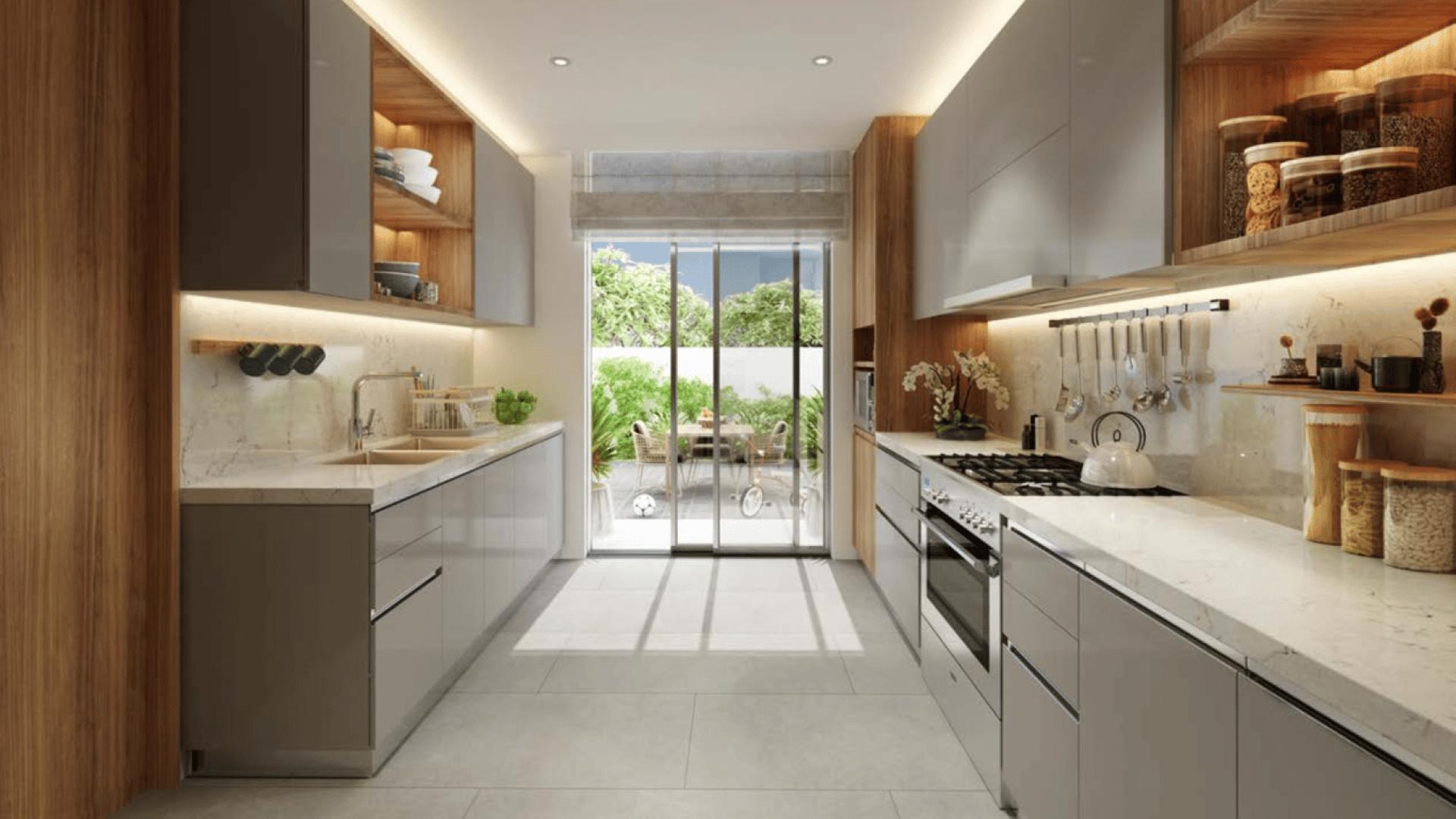 Luxurious living room with pool view in Jebel Ali Village five-bedroom villa for sale