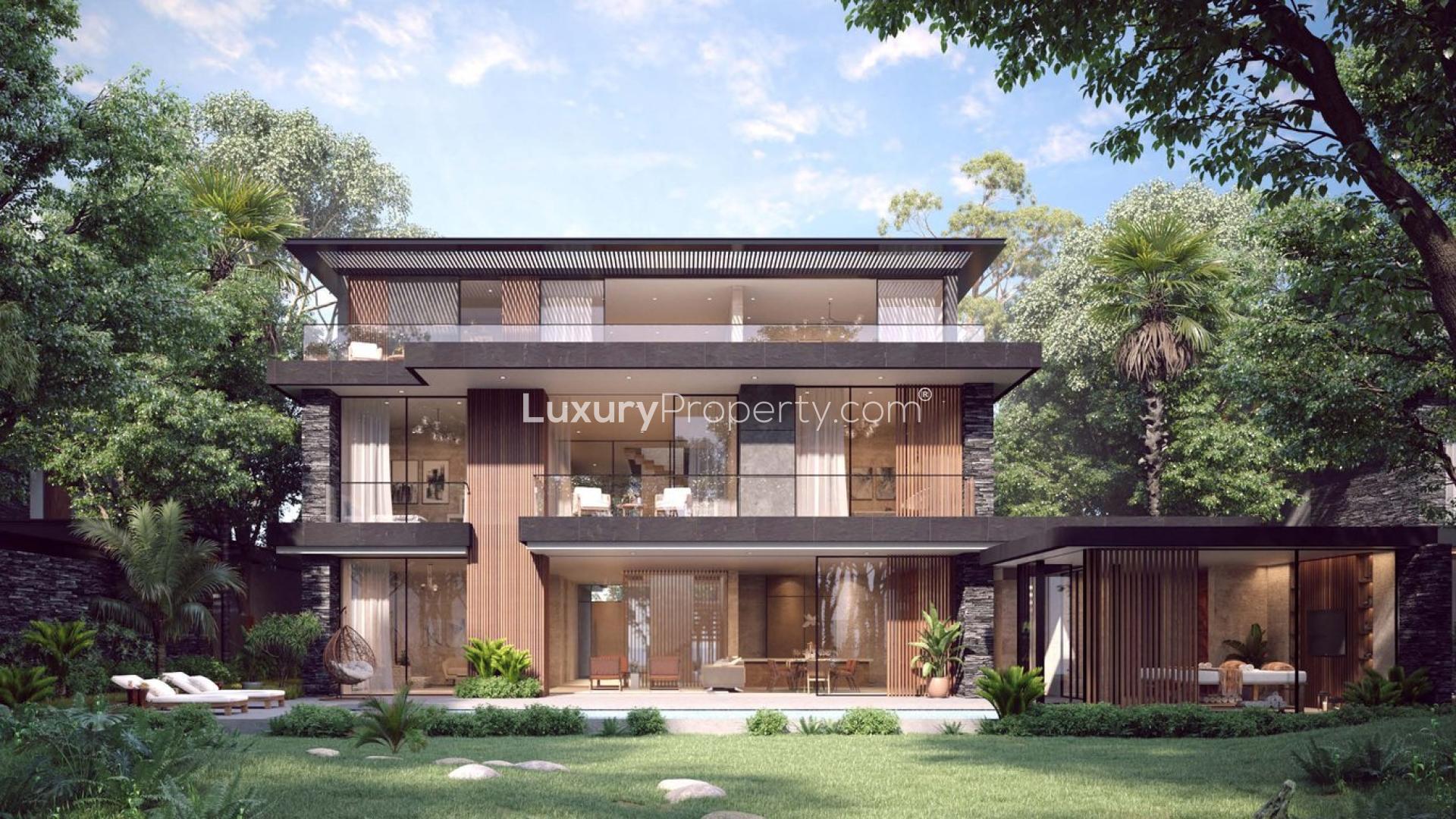 Stunning modern villa exterior with lush garden at Alaya, Tilal Al Ghaf, Dubai