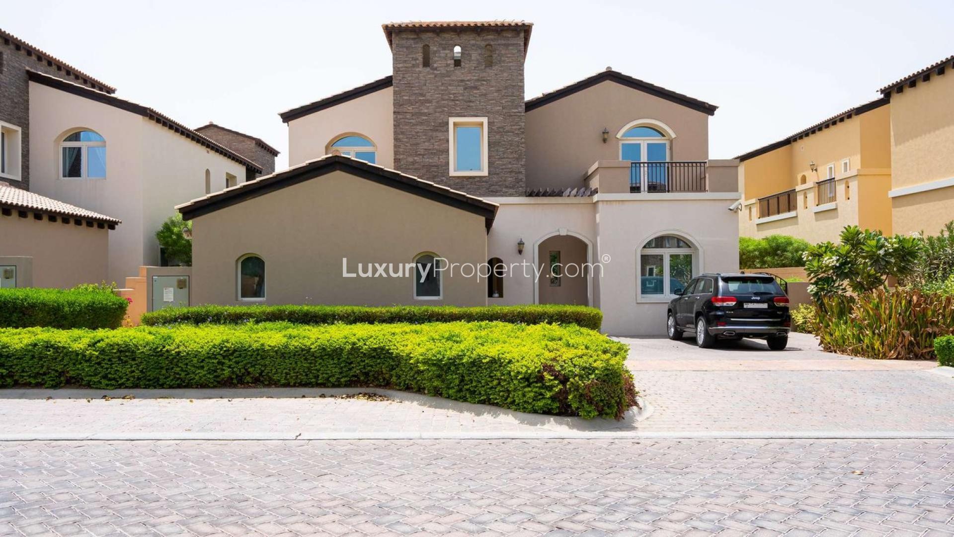5-bedroom villa exterior with driveway in Sienna Lakes, Jumeirah Golf Estates, for sale