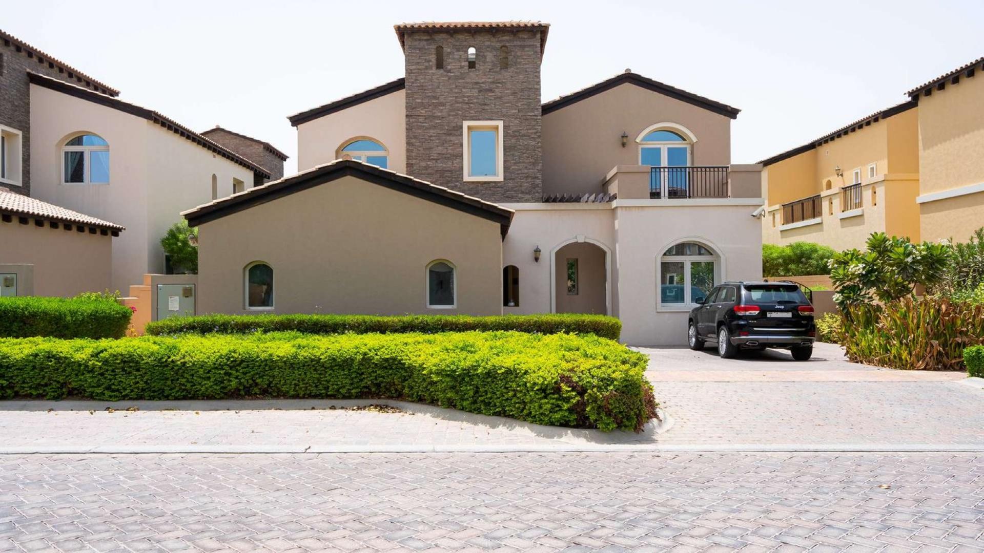 5-bedroom villa exterior with driveway in Sienna Lakes, Jumeirah Golf Estates, for sale