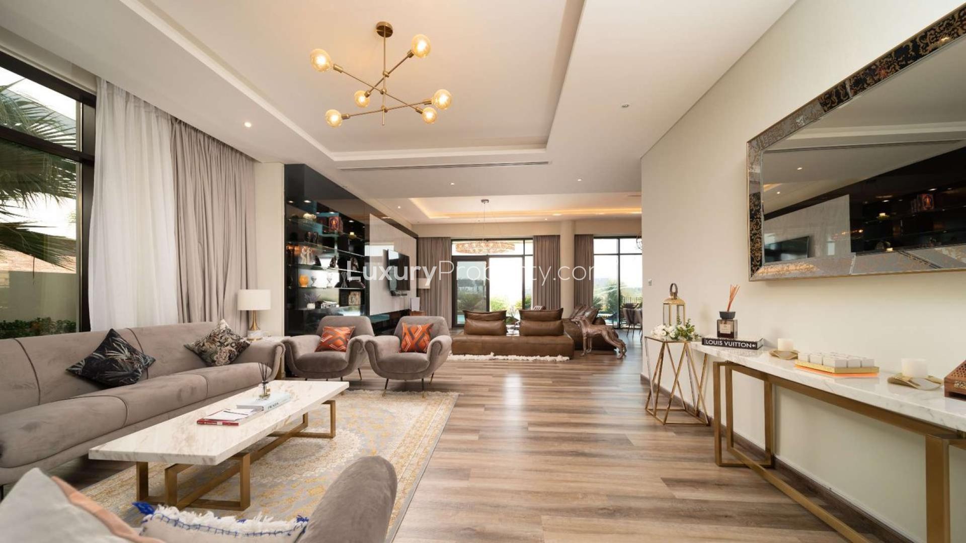 Luxurious villa pool with golf course view in Damac Hills, Brookfield community