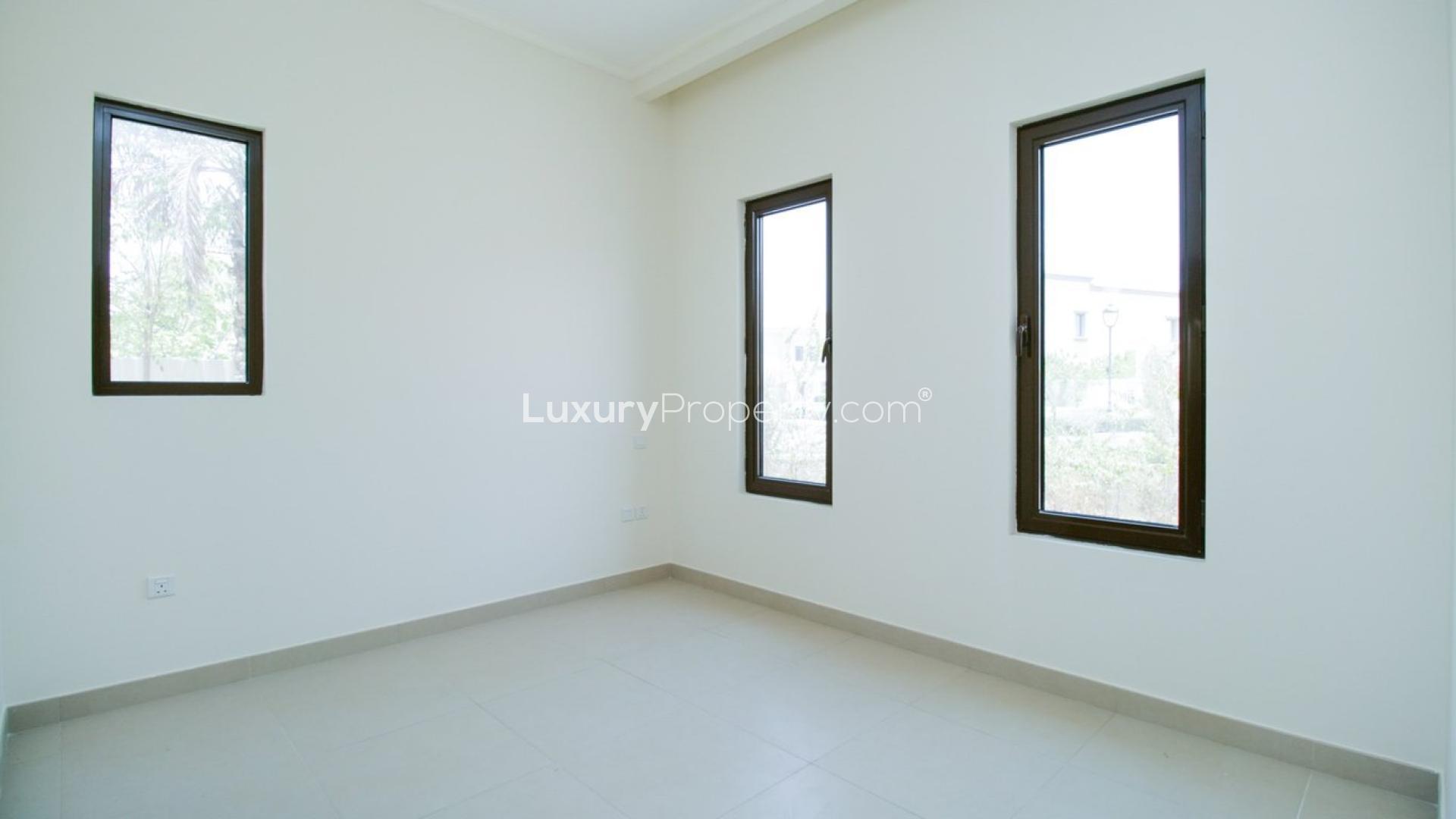 Spacious living room with garden view in Arabian Ranches 2 villa for sale