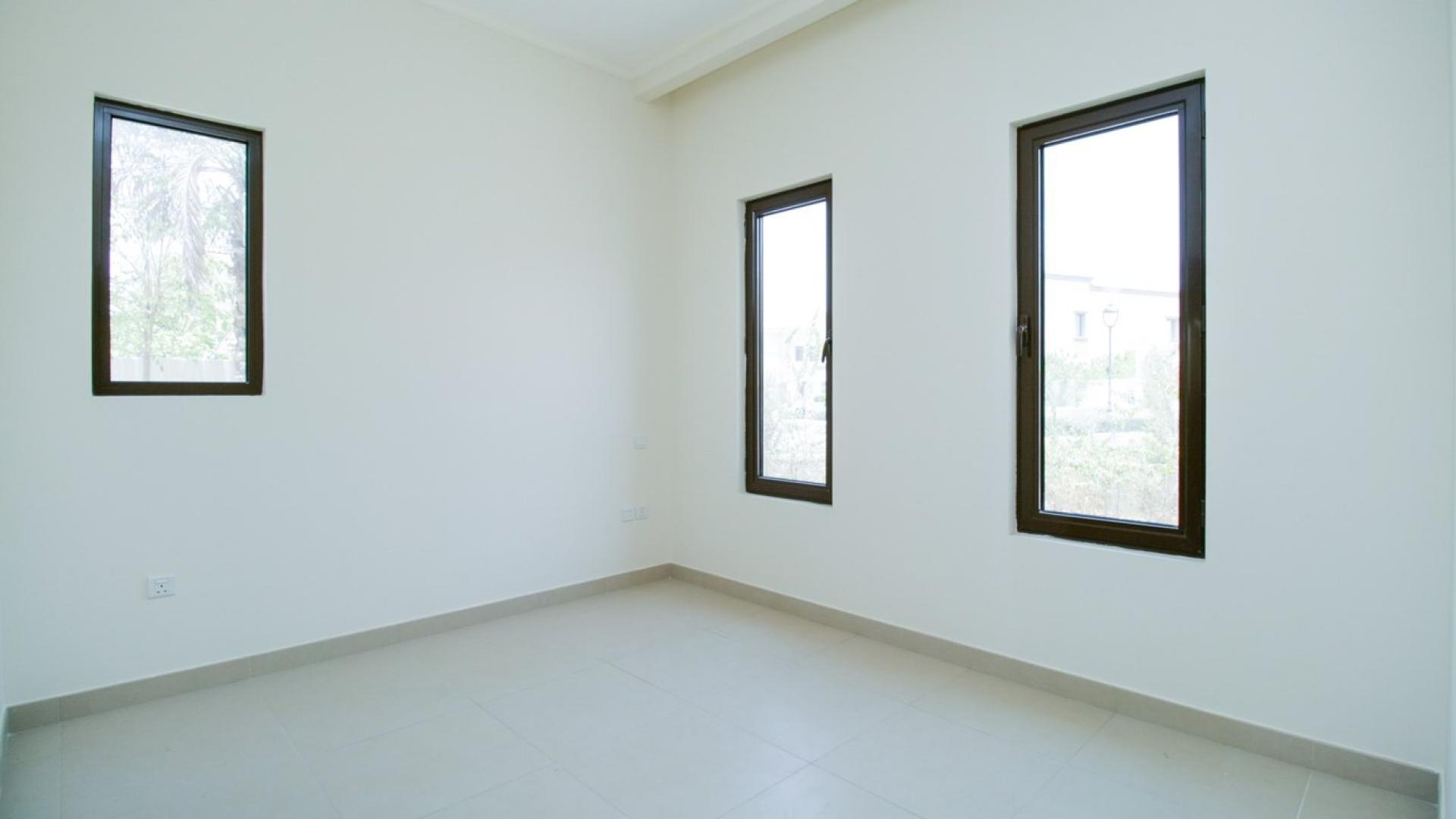 Spacious living room with garden view in Arabian Ranches 2 villa for sale