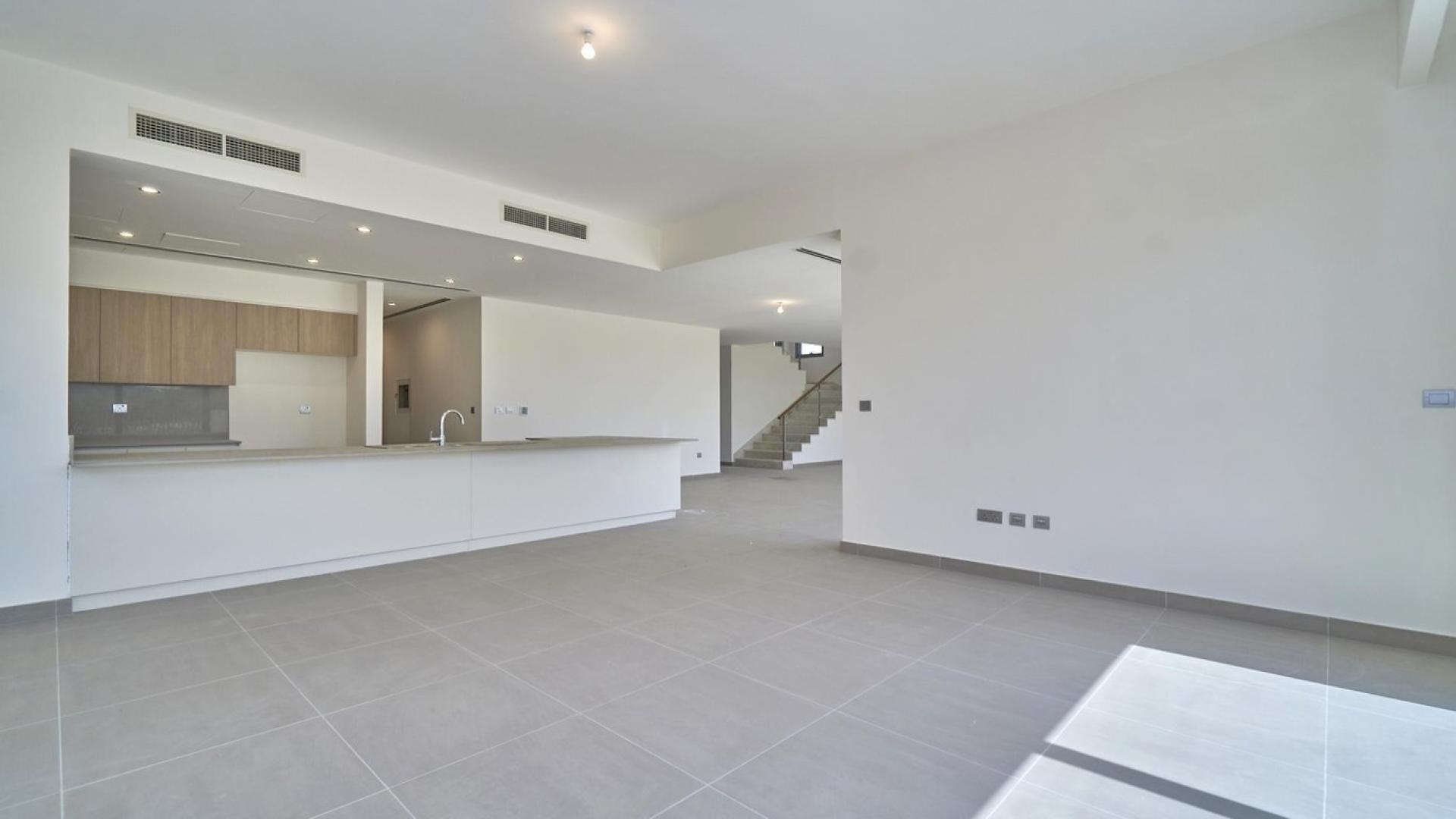 Open-plan living area in elegant 5-bed villa, Sidra Villas, Dubai Hills Estate