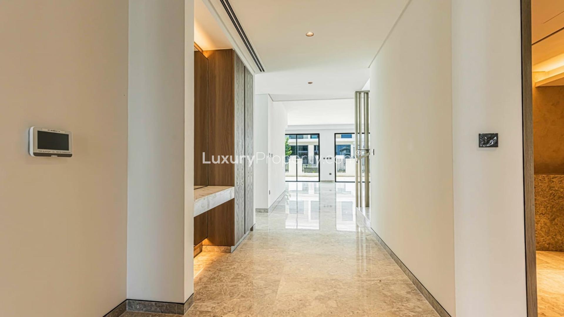 Spacious living area with large windows in Tilal Al Ghaf Harmony 2 villa