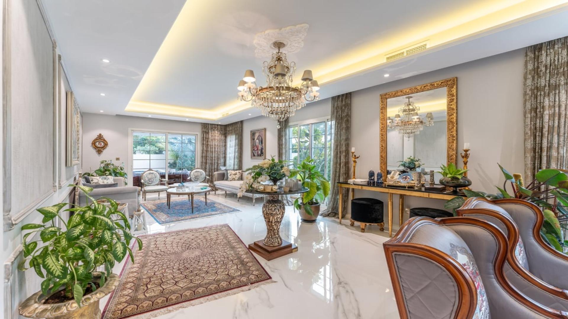 Upgraded single-row corner villa with pool for sale in Rahat, Mudon community