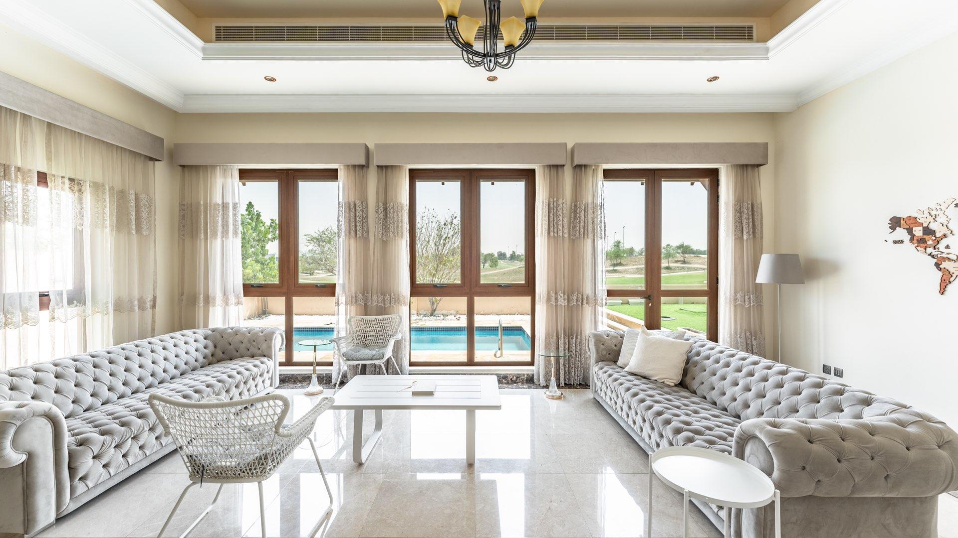 Elegant four-bed villa with private pool in Jumeirah Golf Estates, Fire community, for rent