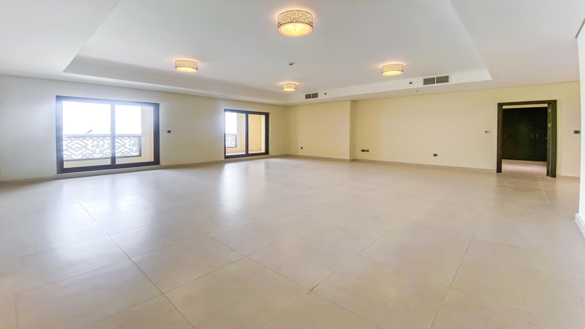 Aerial view of Balqis Residences, Palm Jumeirah, with stunning beachfront and skyline panorama