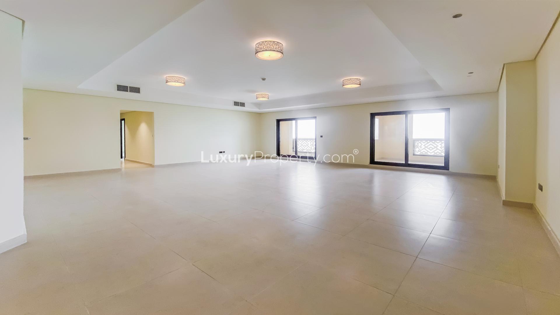 Aerial view of Balqis Residences apartment, Palm Jumeirah, overlooking beach and skyline