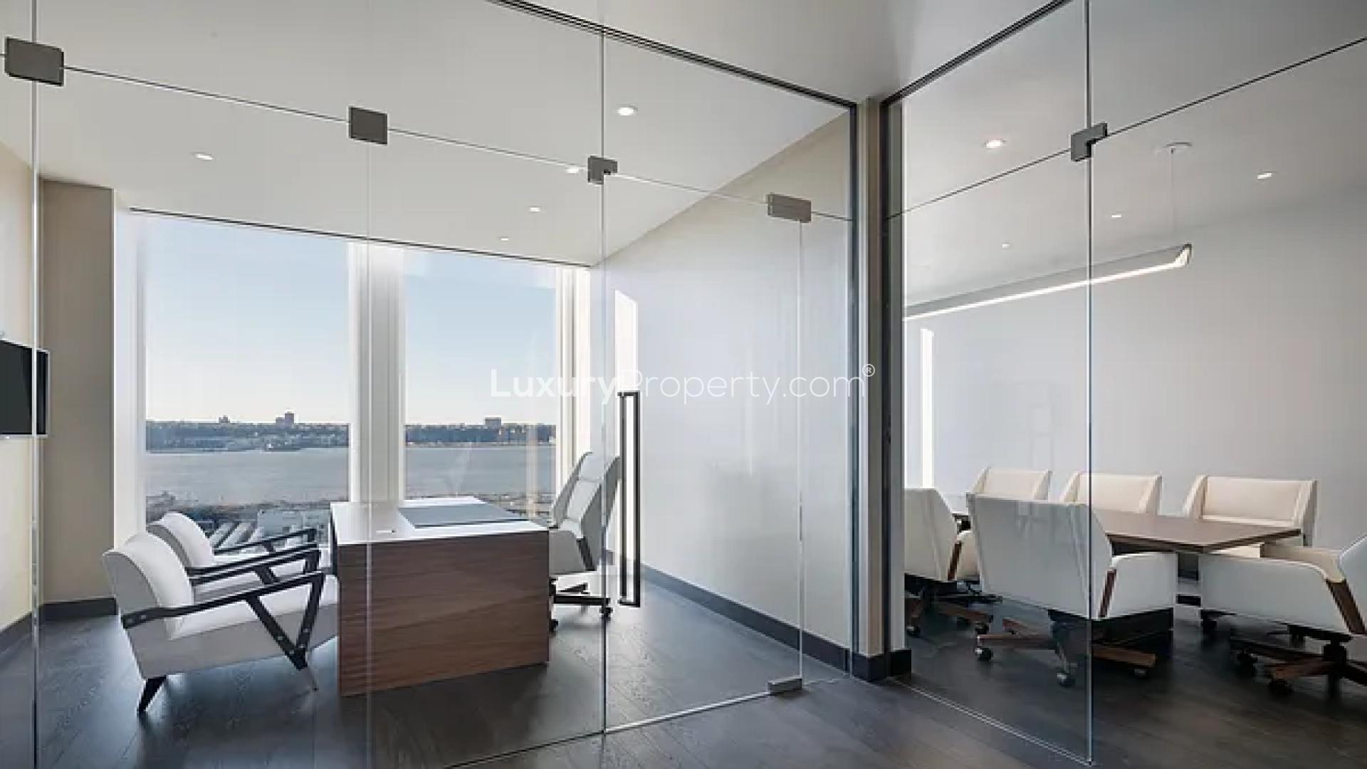 "Bright kitchen with city and river views in 35 Hudson Yards apartment, New York.",Luxurious office space with river views in 35 Hudson Yards apartment, New York