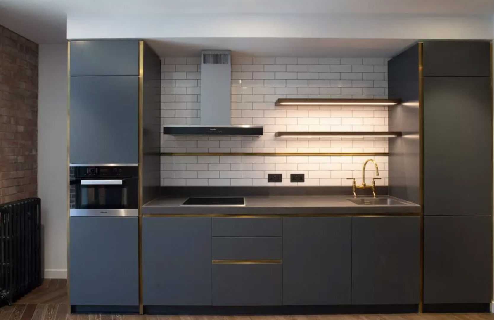 Modern kitchen with large windows in Battersea Power Station apartment, London