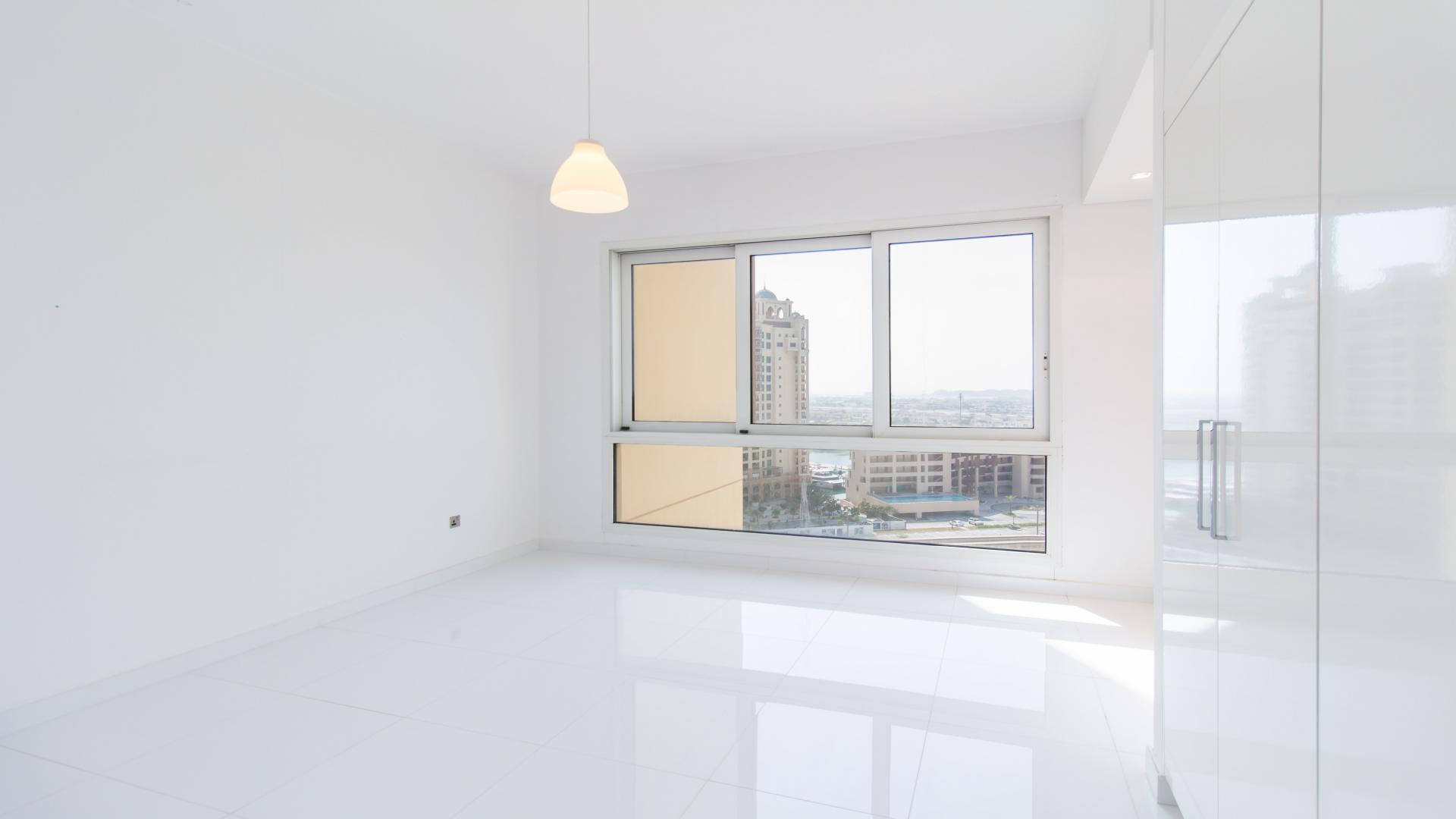 Light-filled living area in Palm Jumeirah apartment, Marina Residences, for sale