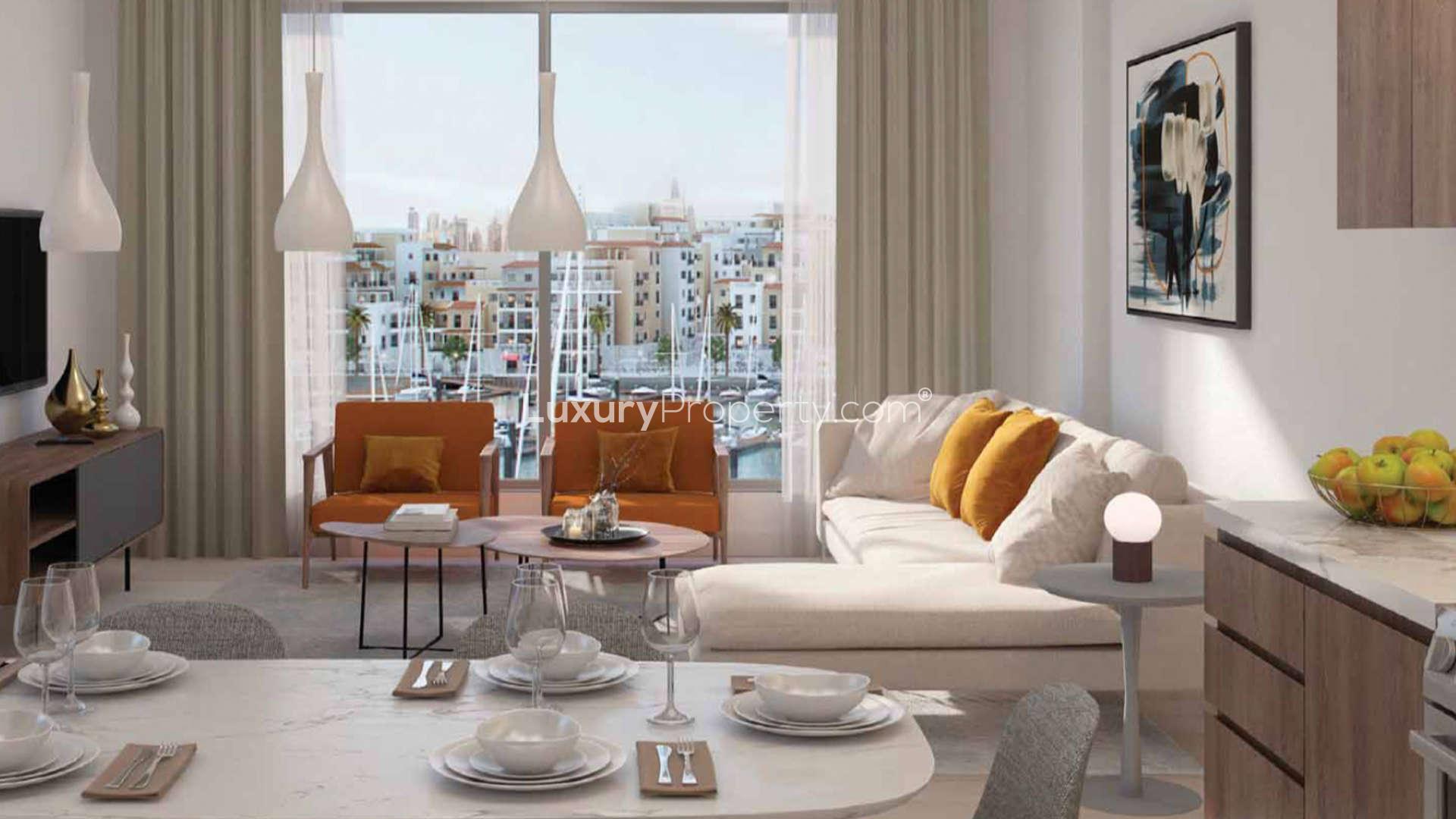 Modern living room in five-bedroom duplex at La Voile, Jumeirah, with marina views