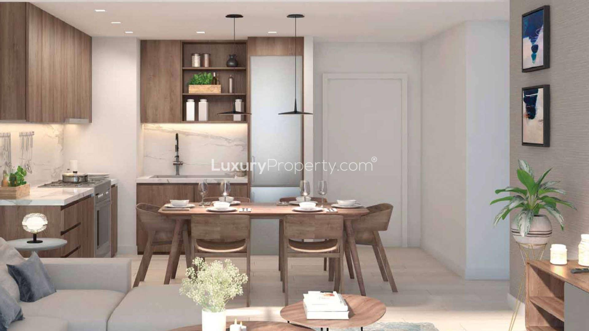Modern kitchen and dining area in five-bedroom duplex at La Voile, Jumeirah, for sale