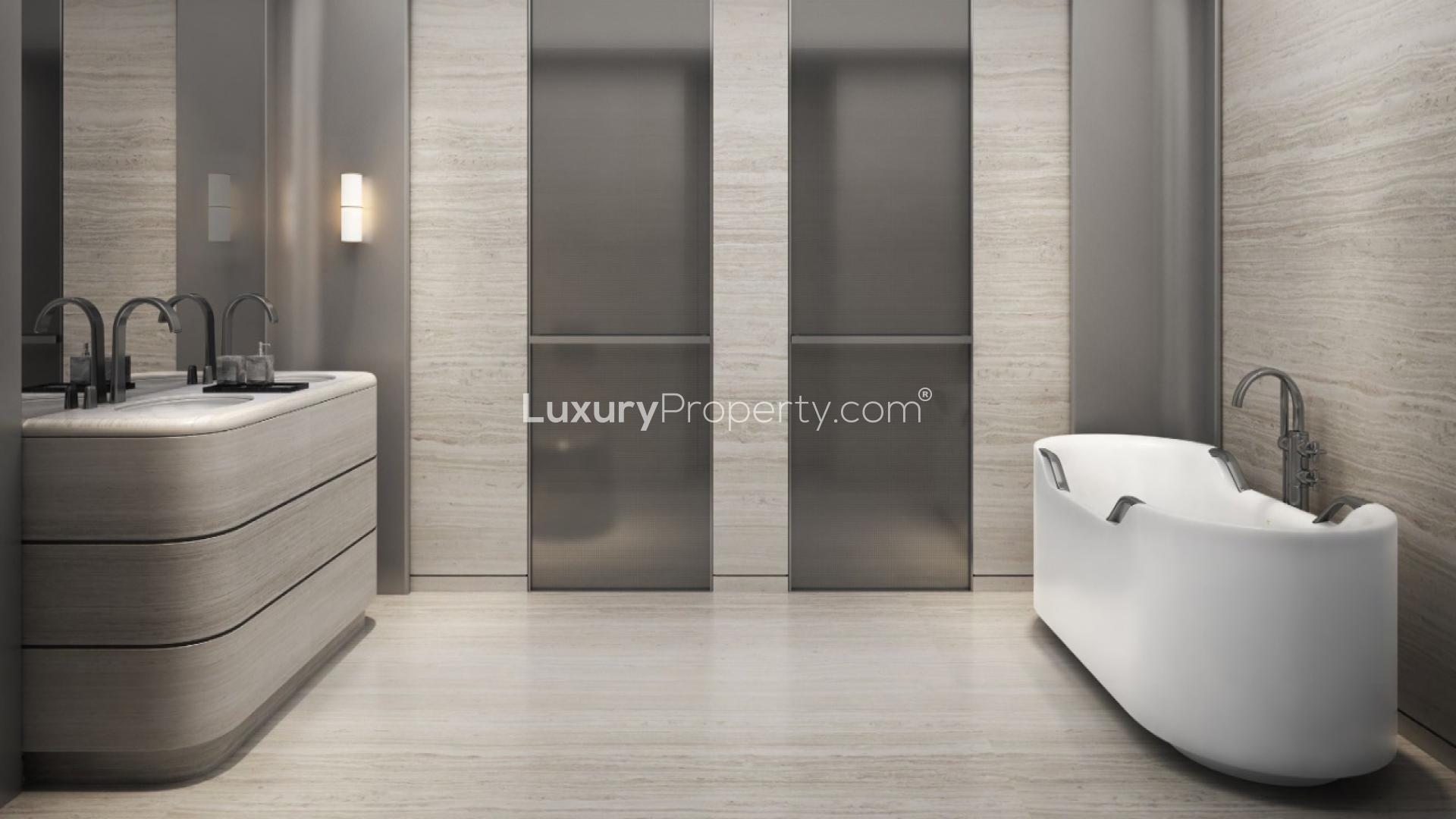 Luxurious bedroom in Armani Beach Residences apartment, Palm Jumeirah with ocean view windows