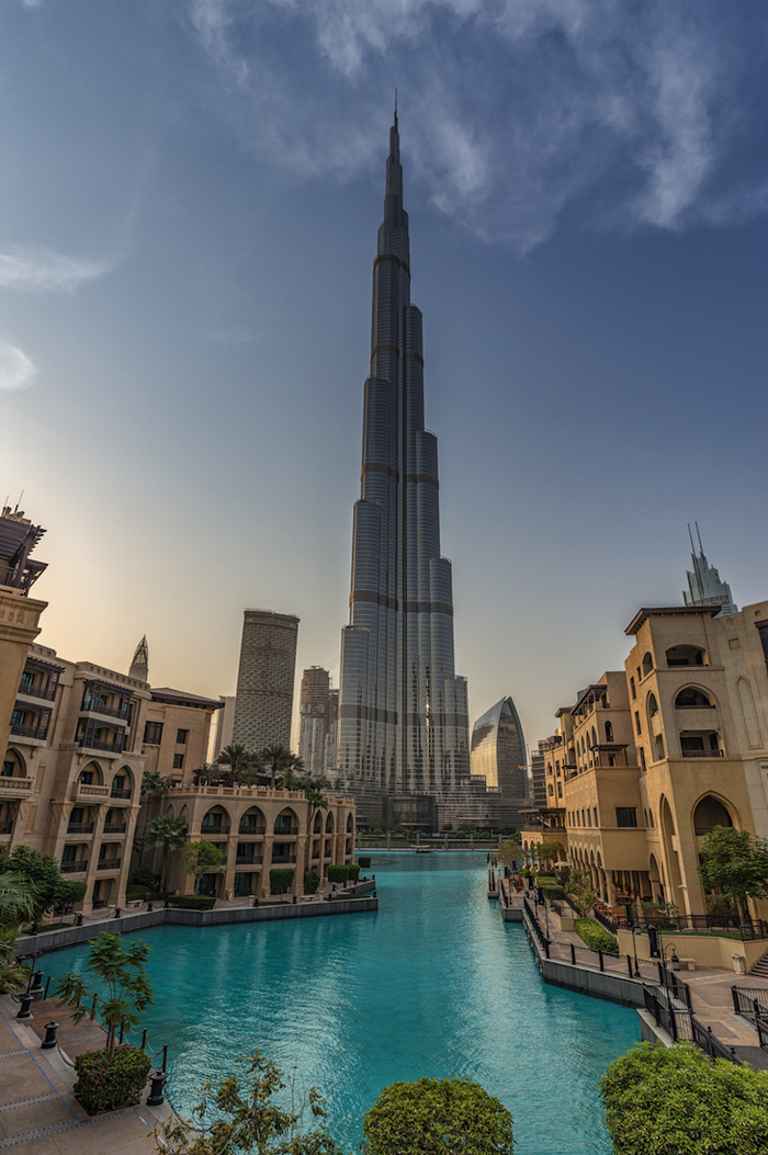Sunset view of The Address Residences Dubai Opera with fountains and skyline in Downtown Dubai