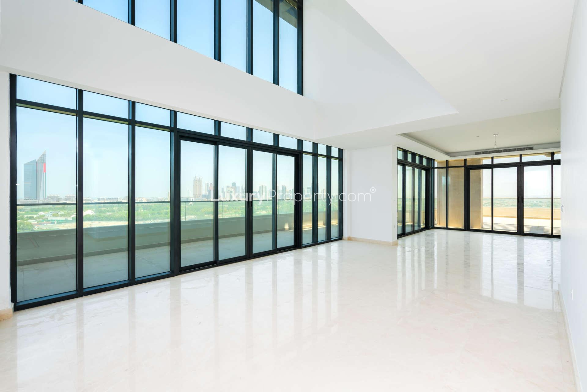 Five-bedroom penthouse view, The Hills A, overlooking lush golf course and modern buildings