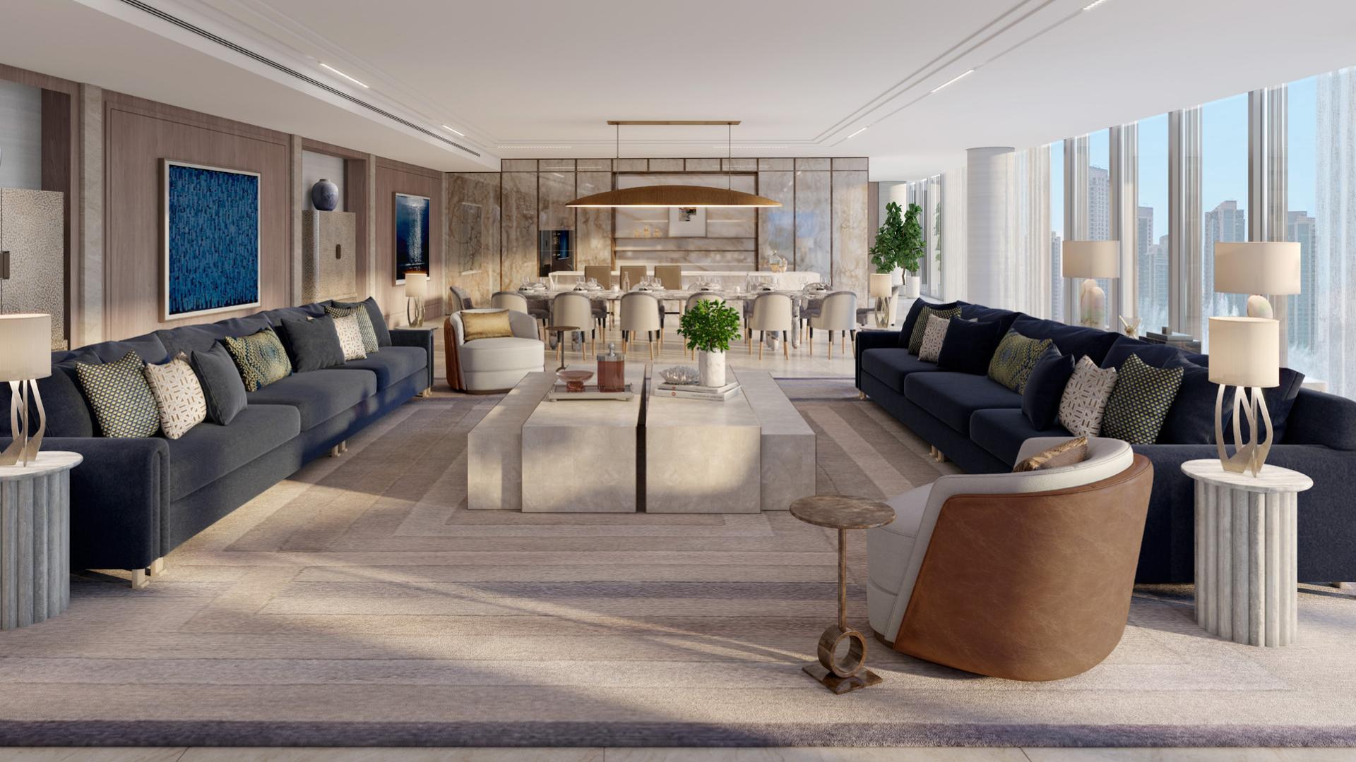 Luxurious penthouse rooftop pool with stunning Burj Khalifa and Dubai Opera views at night