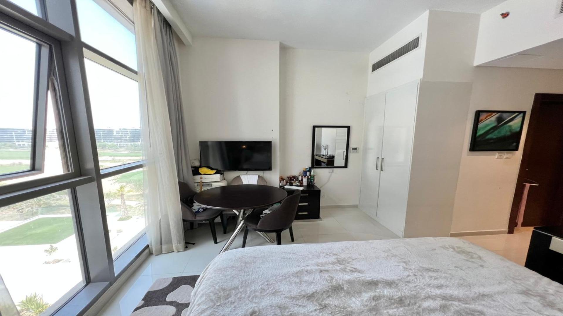 Fully furnished studio apartment with golf views in Damac Hills, Golf Promenade