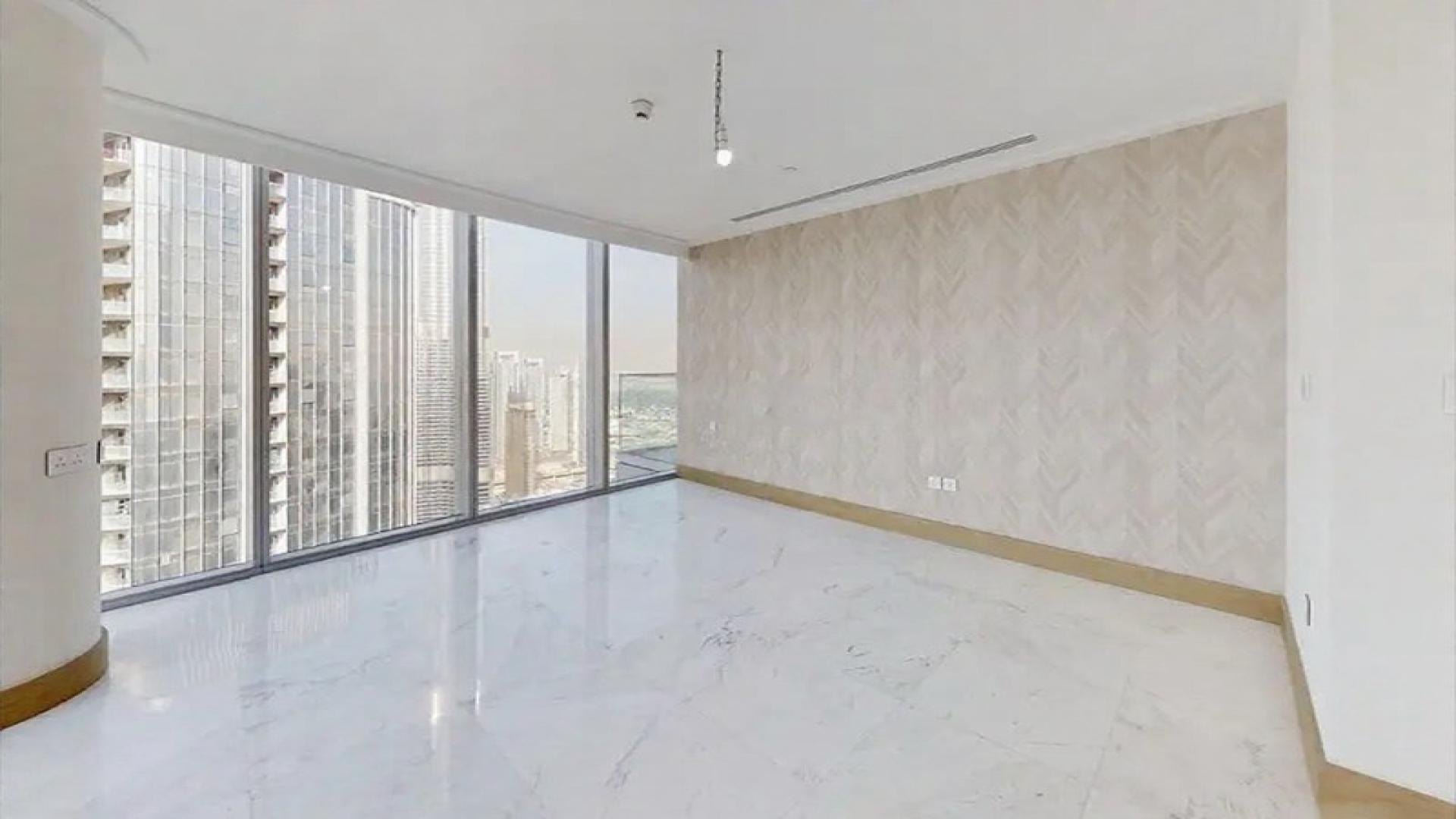 Luxurious penthouse interior with panoramic city views in Opera Grand, Downtown. Rent now