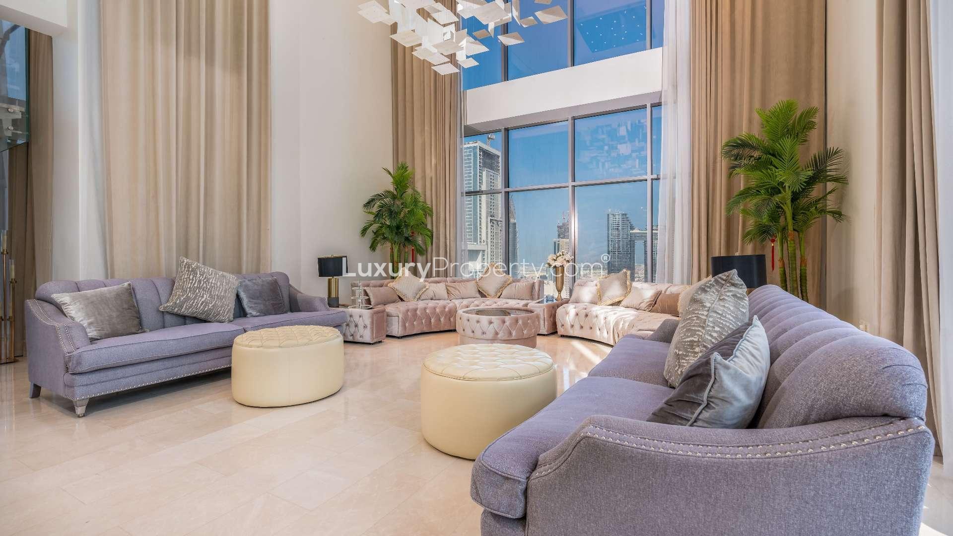 Luxurious penthouse interior with elegant dining area and stunning Downtown Dubai skyline views