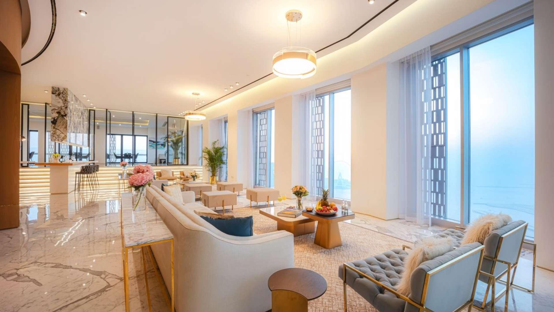Luxurious living room in 5-bedroom penthouse, Cayan Tower, Dubai Marina, with modern decor