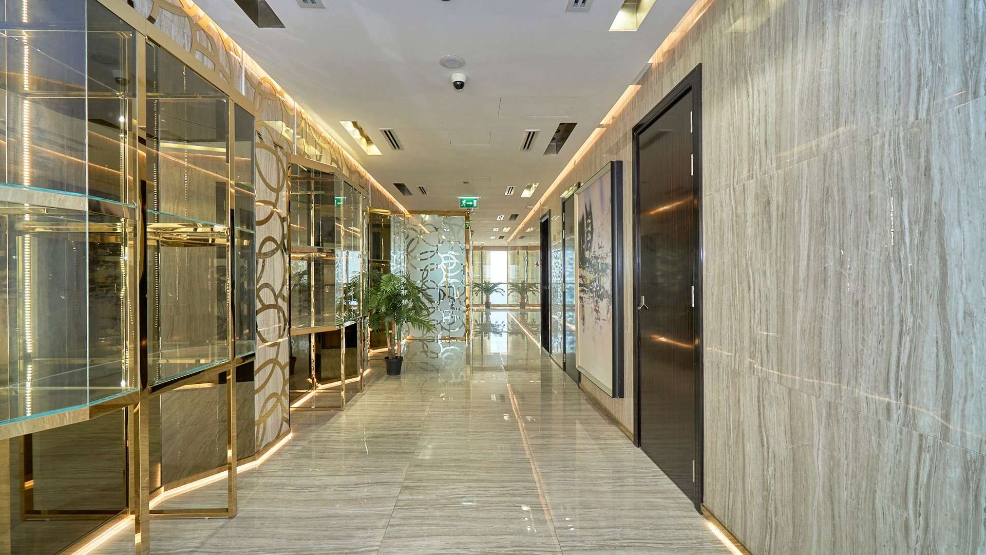 Luxurious DIFC penthouse bedroom with city view, elegant furnishings, and modern decor