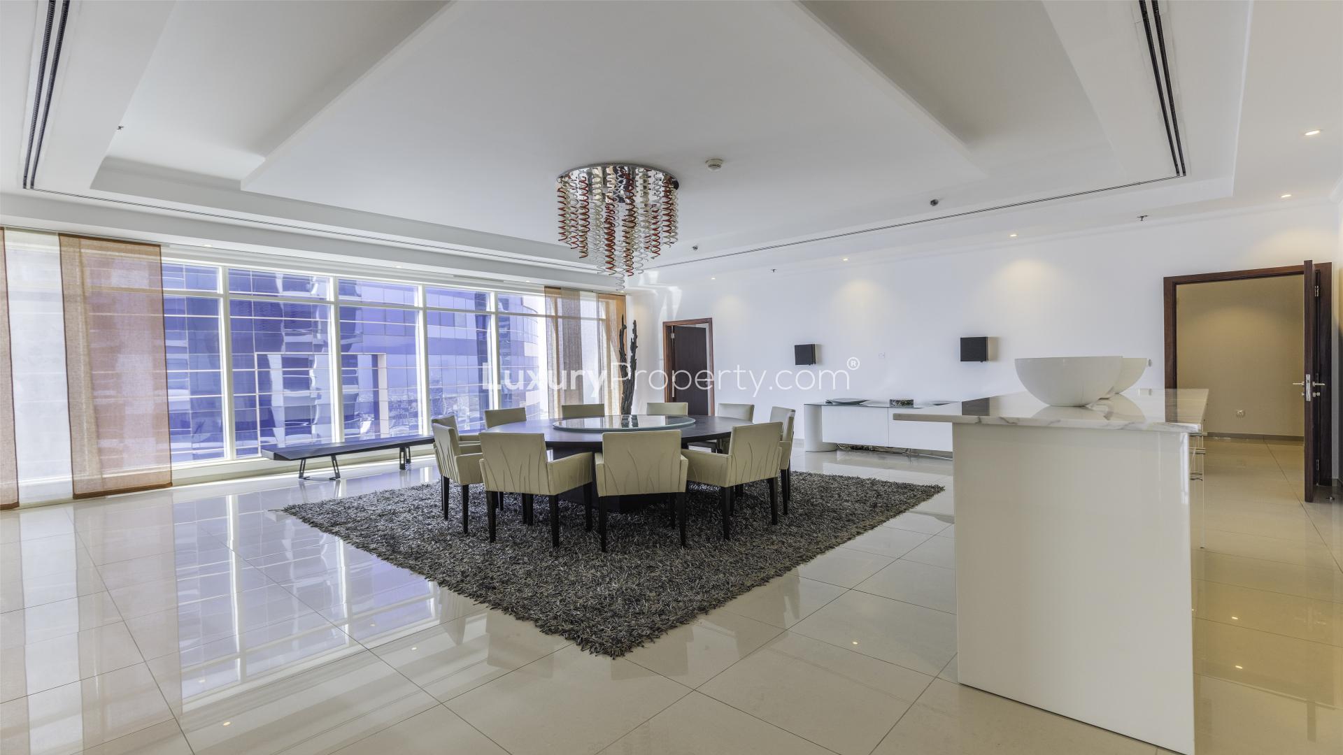 Modern dining area in luxury Dubai Marina penthouse, Emirates Crown, with elegant decor