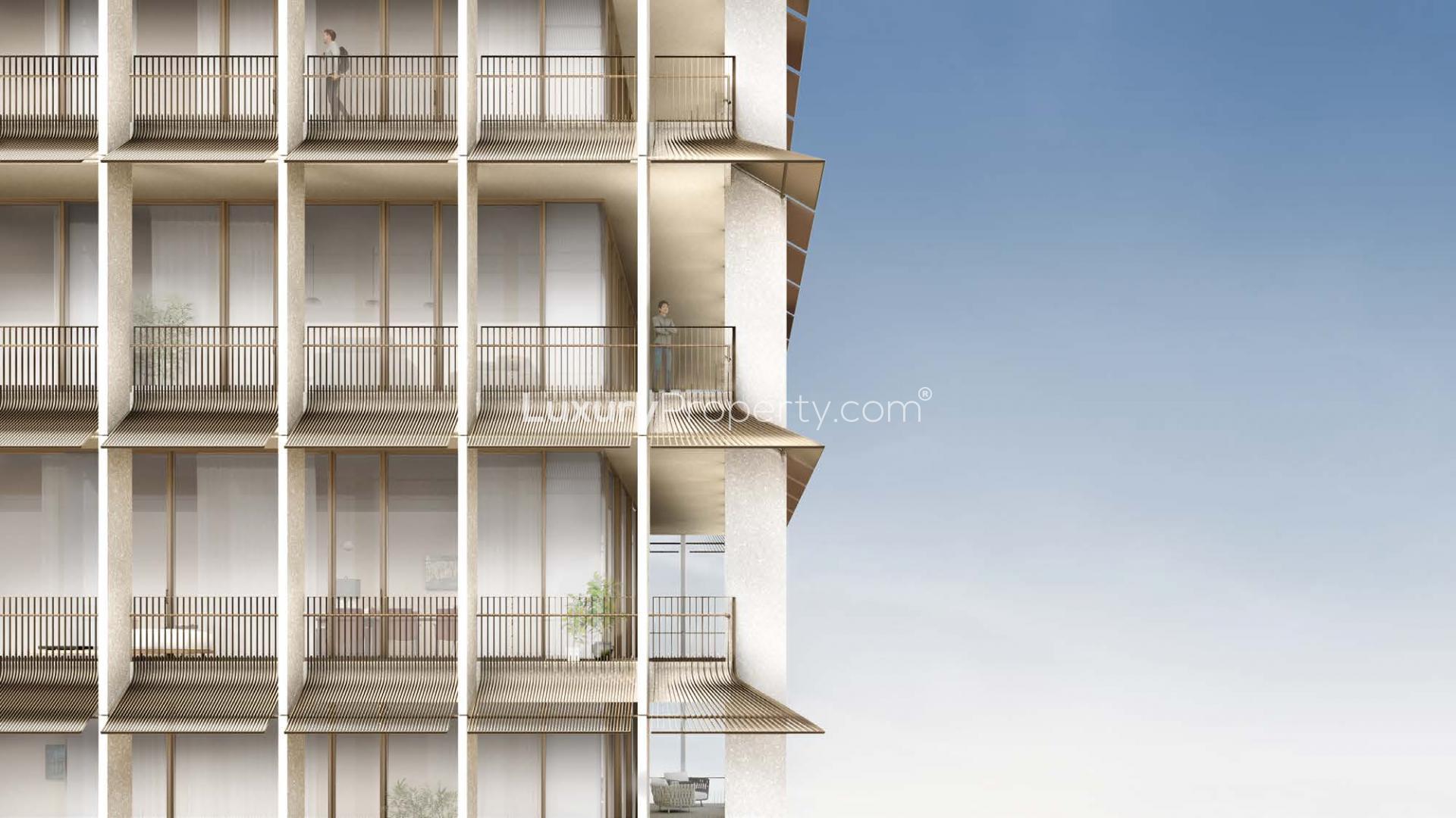 Modern architecture at Four Seasons Residences DIFC, lush greenery and urban luxury living