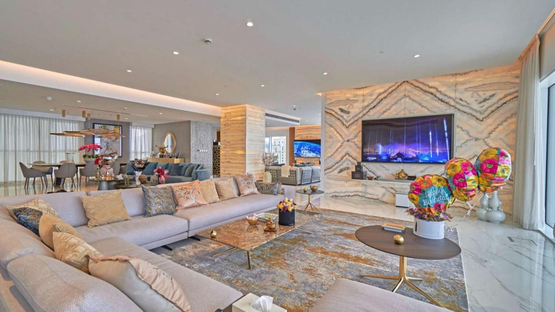 Luxurious living room in beachfront penthouse, Jumeirah Beach Residence, elegant decor and spacious design