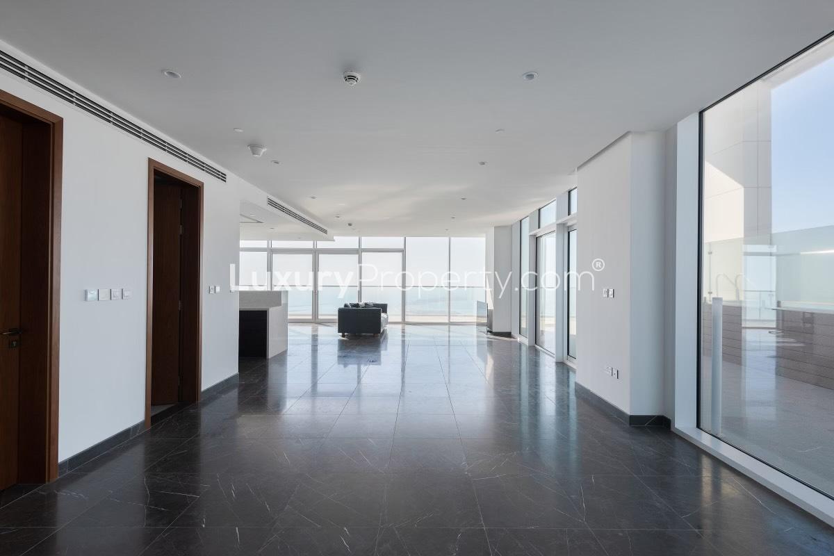 Aerial view of beachfront penthouse at Jumeirah Beach Residence, Dubai, with stunning sea views