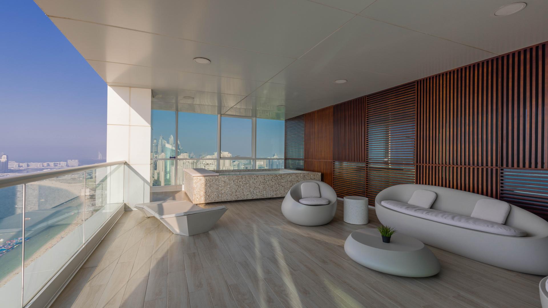 Dining area with sea view in Jumeirah Beach Residence penthouse, Al Bateen Residences