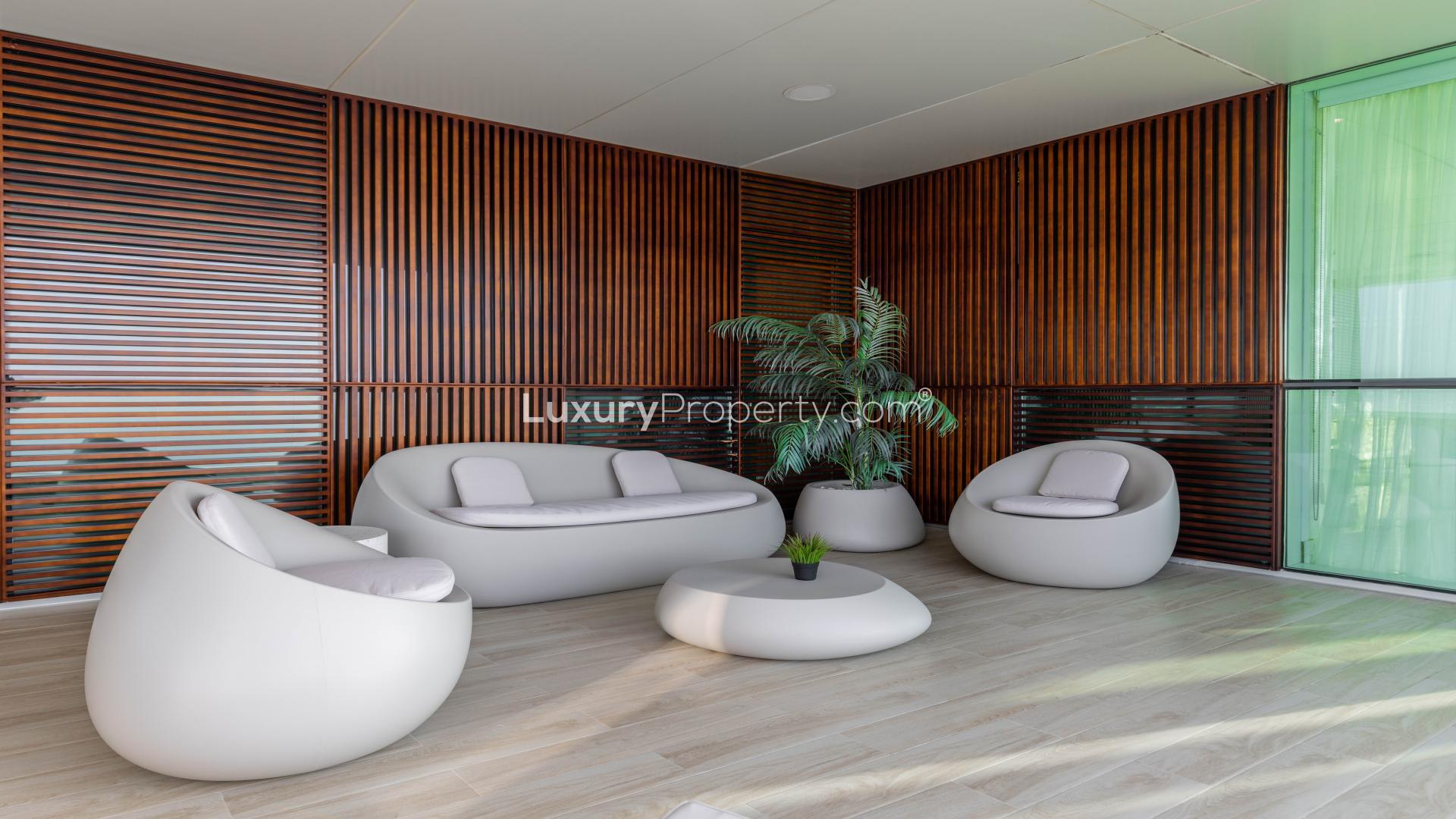 Aerial view of Jumeirah Beach Residence near Al Bateen Residences, showcasing sea and skyline