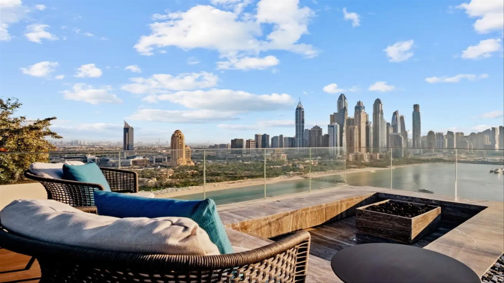 Luxurious penthouse living room with panoramic views at One at Palm Jumeirah, Dubai