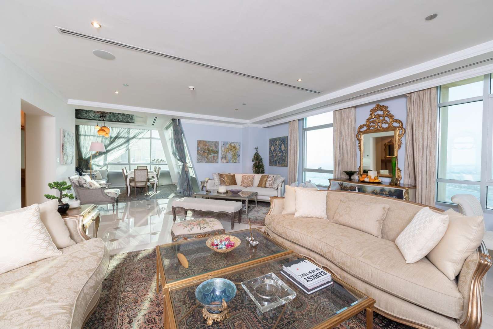 Luxurious living room in 6-bedroom penthouse, Marina Crown, Dubai Marina. Spacious and elegant decor