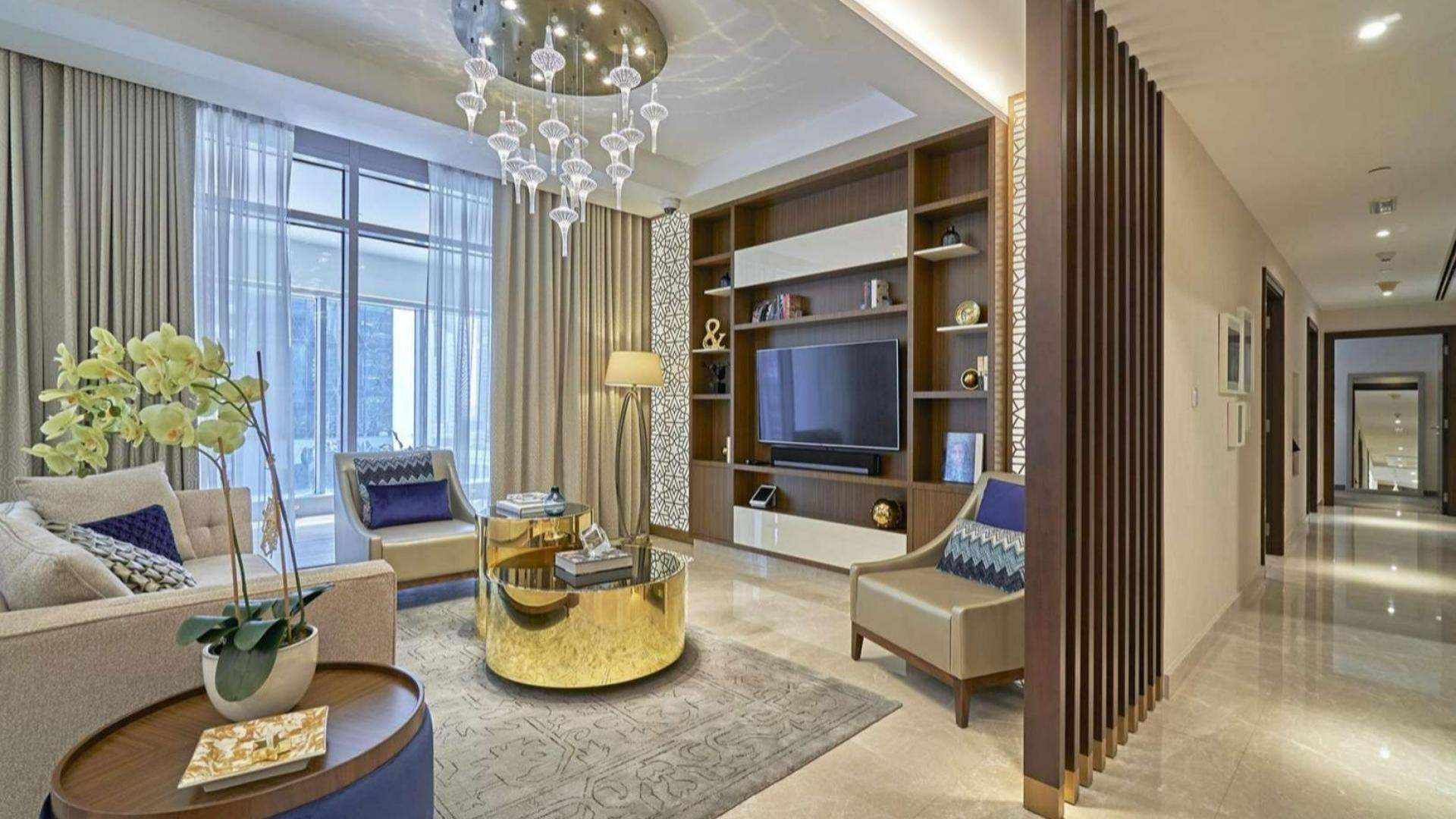 Penthouse corridor with floor-to-ceiling windows, view of Downtown Dubai skyline and Burj Khalifa