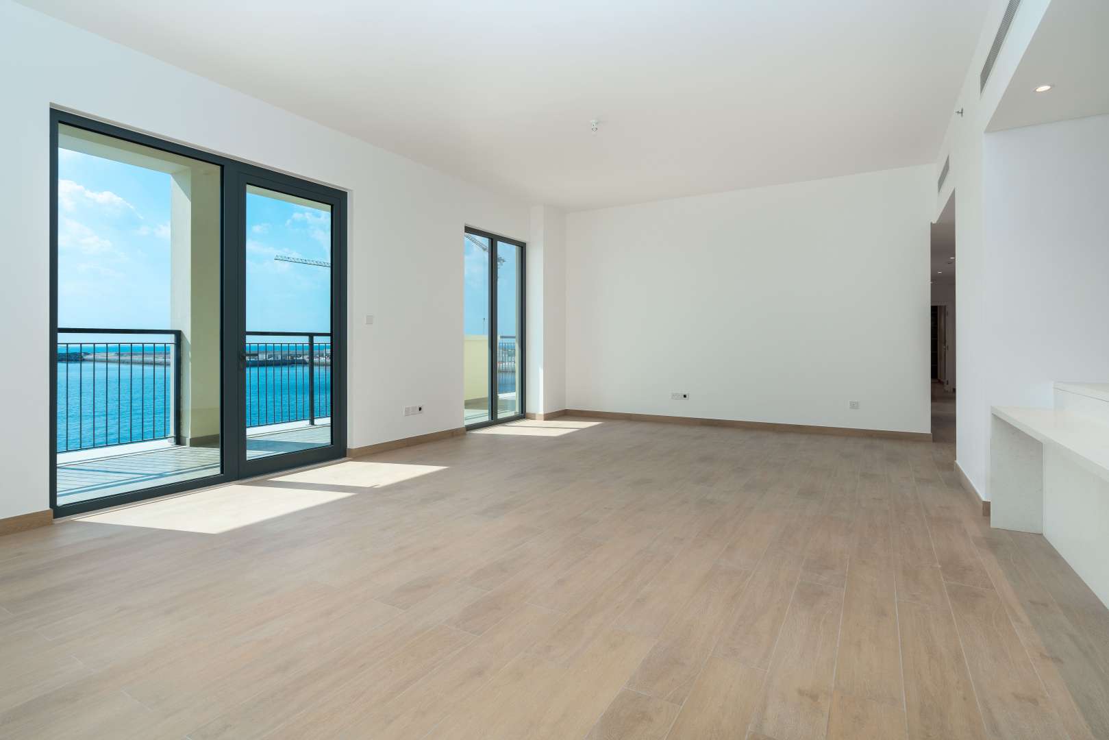 Luxurious penthouse sea view from living room in La Rive, Port de La Mer, Dubai
