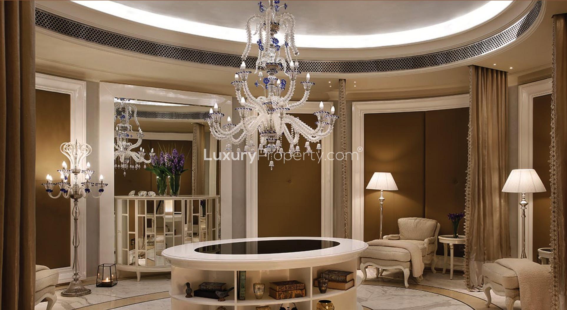 Luxurious dining area with chandelier in Noura Tower penthouse, Al Habtoor City, Business Bay