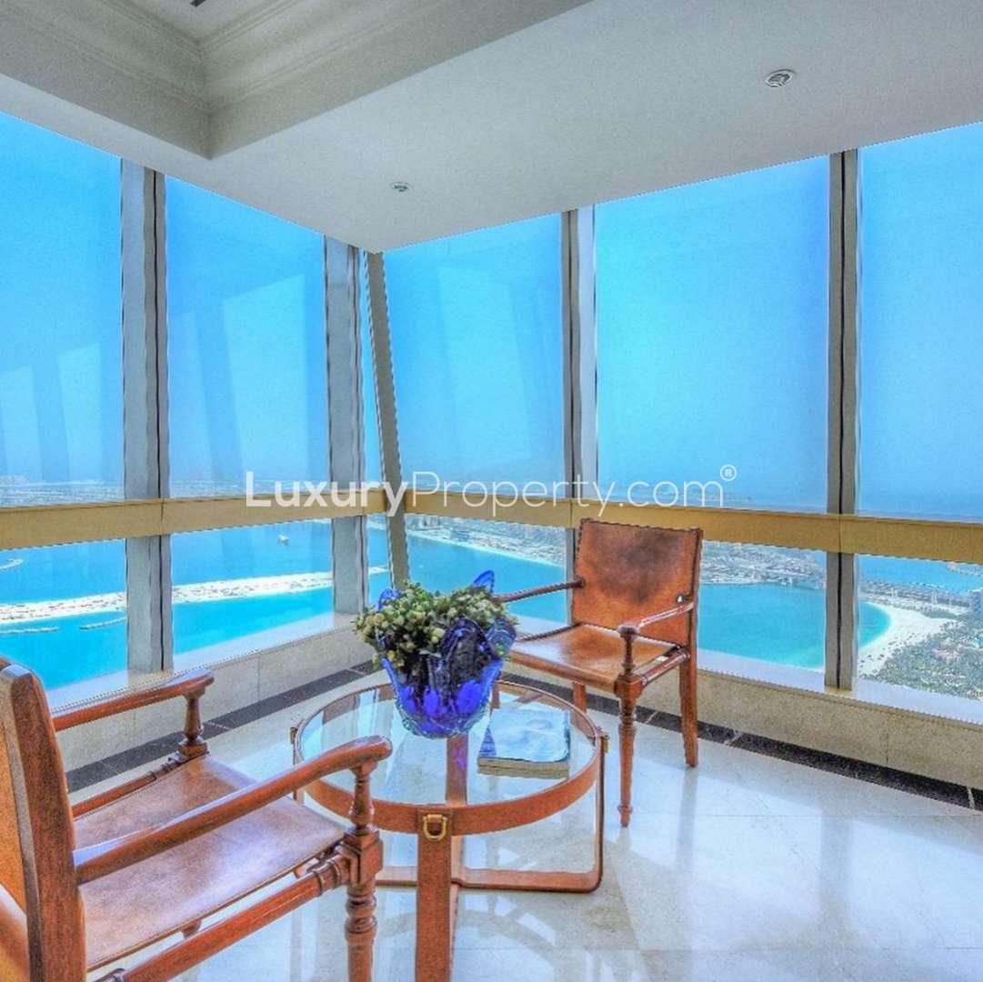 Luxurious Dubai Marina penthouse interior with panoramic ocean views and elegant ceiling design